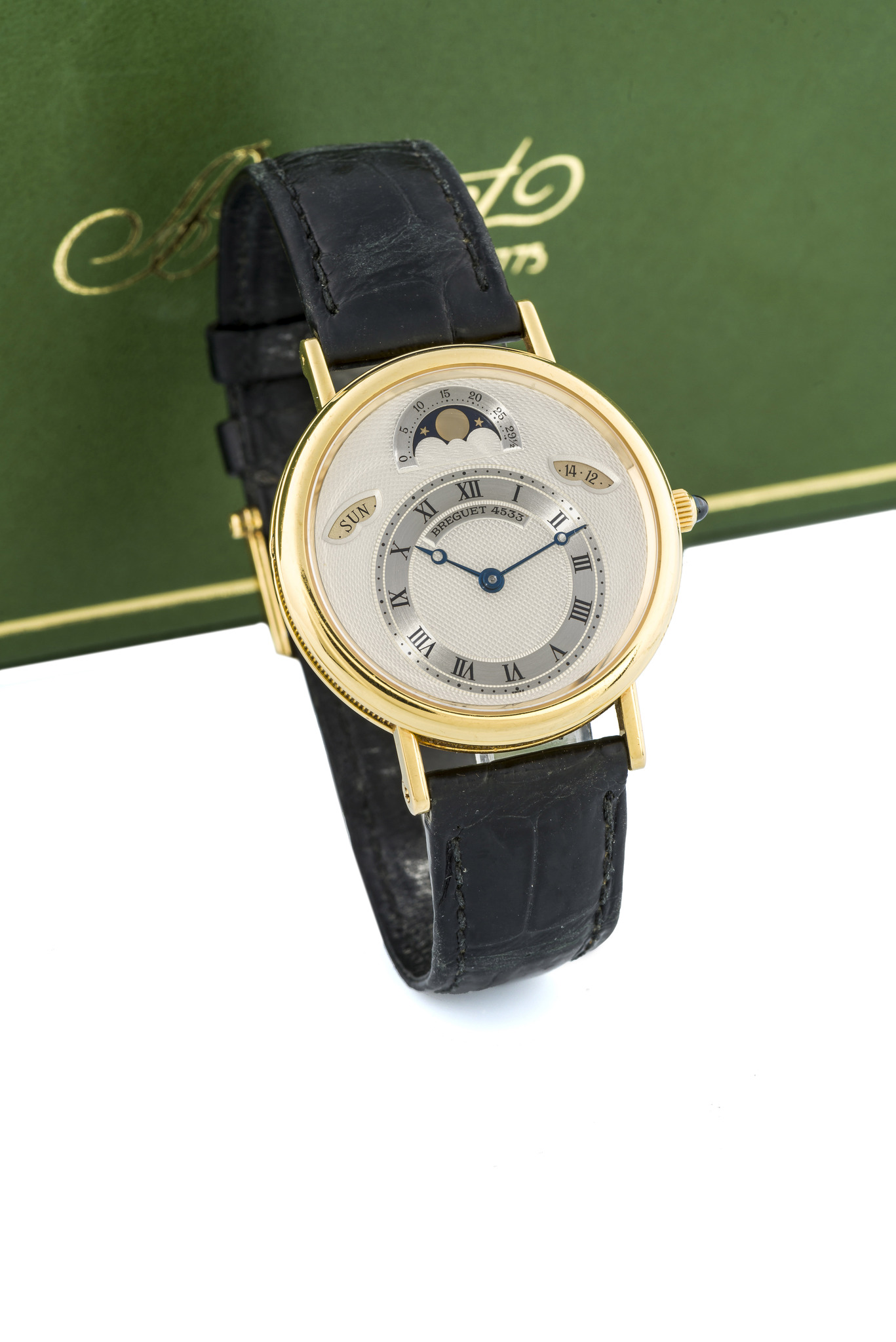 BREGUET, DAY DATE, MOONPHASE A fine and attractive, self-winding, 18k yellow gold wristwatch with day, date and moonphase