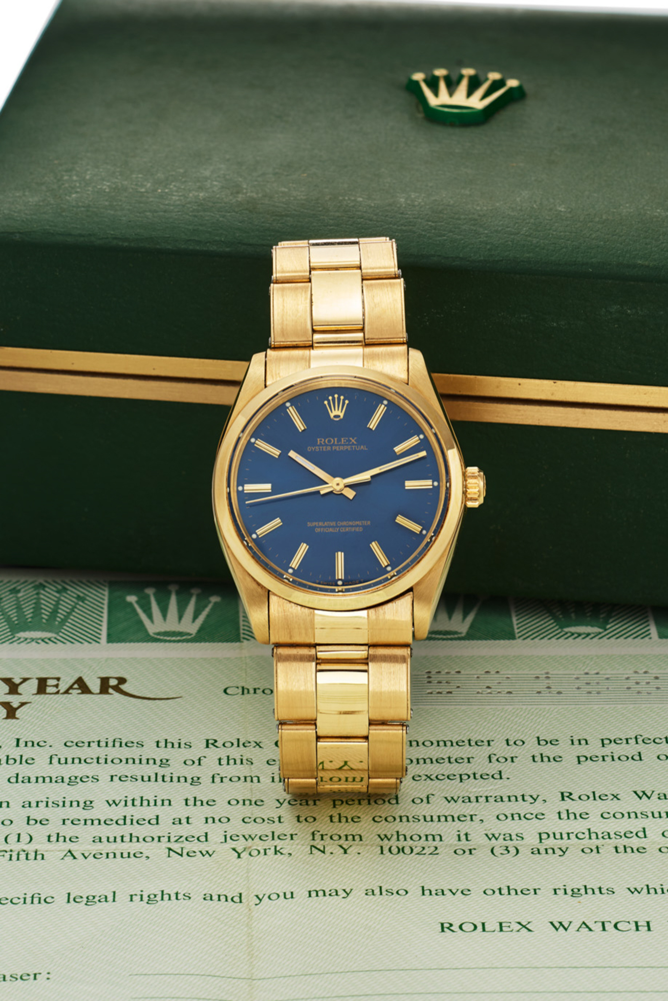 ROLEX REF. 1002 / 1005, BLUE DIAL; “OYSTER PERPETUAL”; 14K YELLOW GOLD