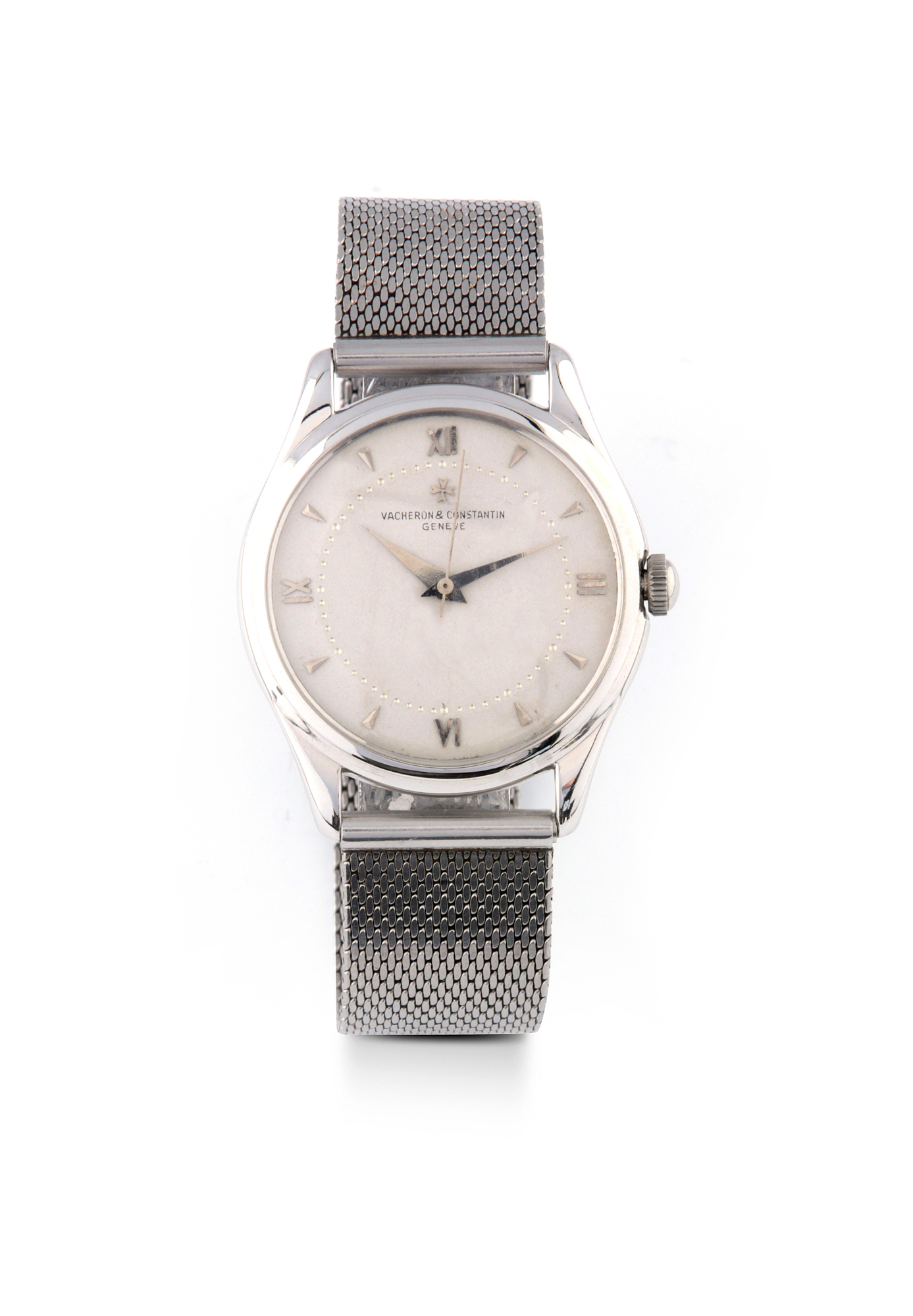 VACHERON CONSTANTIN, STAINLESS STEEL 
Vacheron Constantin, case No. 324015. Made circa 1952. 
Fine, stainless steel manual winding wristwatch with silver dial. 
Rare montre bracelet en acier. Boitier rond. Cadran argente avec index appliques 
triangulaires et romains. Aiguilles dauphine. Mouvement mécaniquemanuel. Bracelet acier élastique anonyme. Cadran, boitier et mouvementsignes.