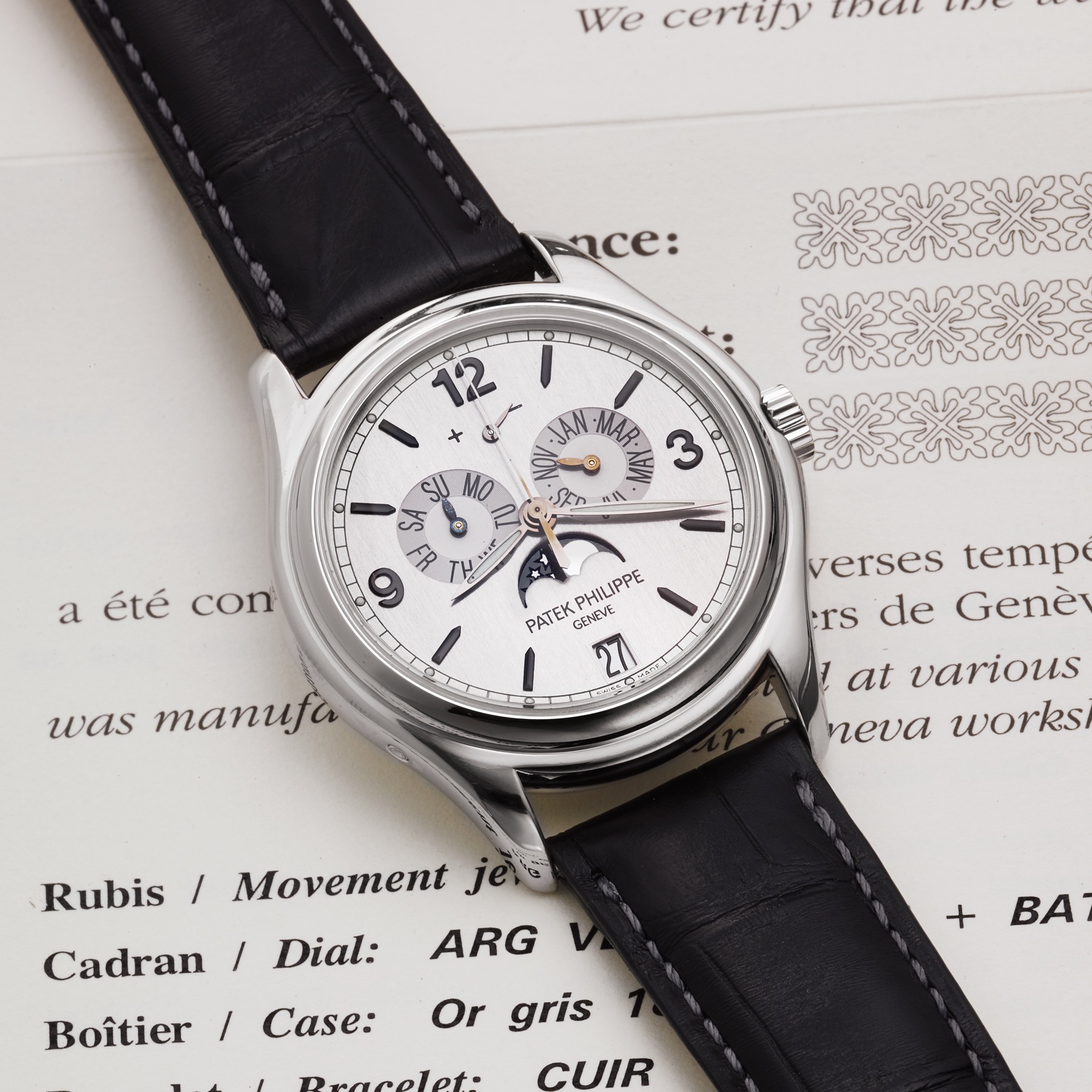PATEK PHILIPPE REF. 5250 ADVANCED RESEARCH WHITE GOLD 
Patek Philippe, Genève, Ref. 5250G. Made in a limited edition of 100 pieces in 2005. 
Very fine, rare and innovative, center seconds, self-winding, water-resistant, 18K white gold wristwatch with annual calendar, power-reserve indication, moon phases, silicon escape wheel and an 18K white gold 
Patek Philippe deployant clasp. Accompanied by an original fitted box, Certificate of Origin, and booklets.