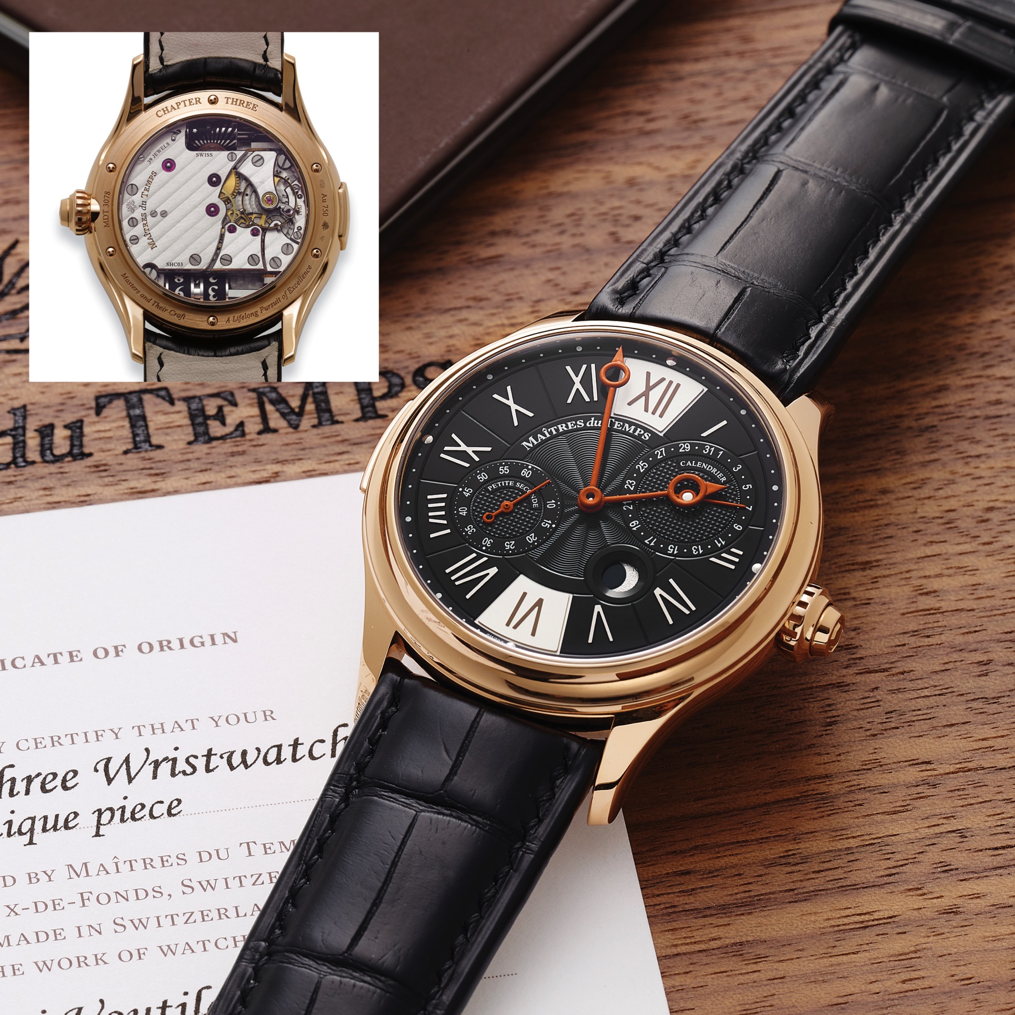 MAITRES DU TEMPS CHAPTER THREE UNIQUE PIECE 
WITH SPECIAL ORDERED DIAL & HANDS PINK GOLD
Maitres du Temps, Chapter Three (collaboration between Kari Voutilainen and 
Andreas Strehler), Swiss, Piece Unique. Made circa 2014
A very fine and rare, water resistant, 18K pink gold moon phase calendar wristwatch with 
concealed second time zone and day/night indication with an 18K pink gold Maitres Du Temp buckle. 
Accompanied by a presentation case, Certificate of Authenticity, instruction bookle