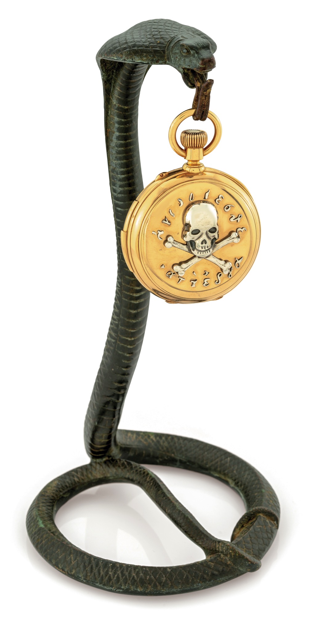 PAUL BUHRE MINUTE REPEATING & PERPETUAL CALENDAR "ILLUMINATI" YELLOW GOLD
Paul Buhre, St. Petersbourg, No. 2257. Made circa 1885. 
Very fine and very rare, large, heavy, minute-repeating, 18K yellow gold and silver-mounted, 
hunting-cased, keyless pocket watch with perpetual calendar, phases of the moon and lunar 
calendar. Accompanied by a bronze serpent-form stand.