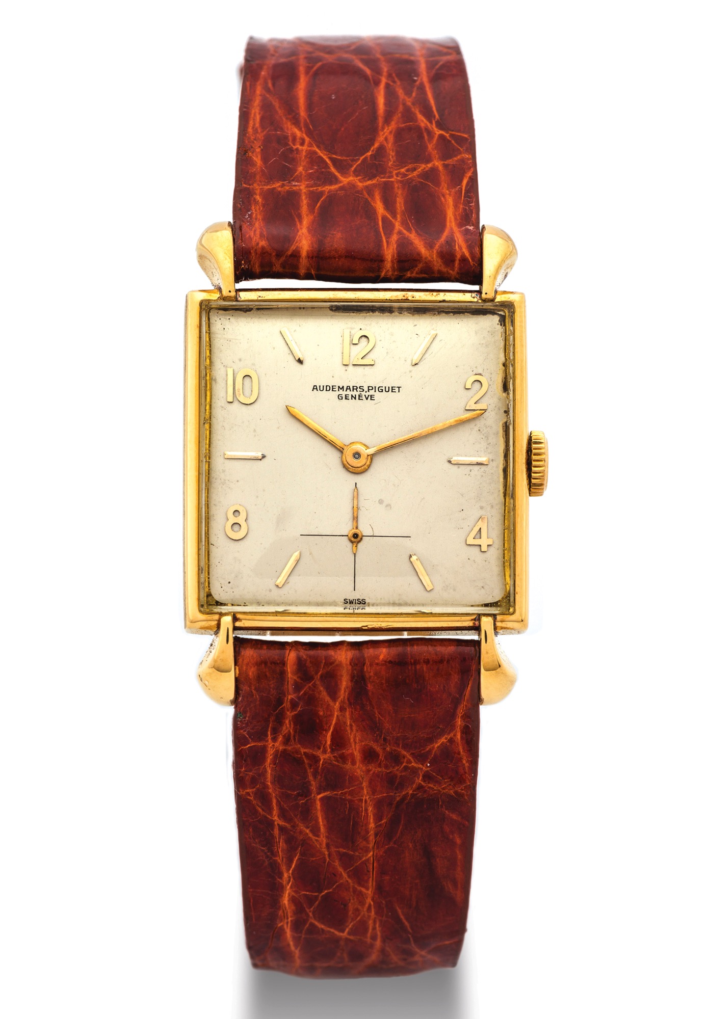 AUDEMARS PIGUET YELLOW GOLD 
Audemars Piguet, Genève, No. 54773. Made circa 1964. 
Very fine and rare, elegant, thin, square, 18K yellow gold wristwatch with an 
18K yellow gold buckle.
