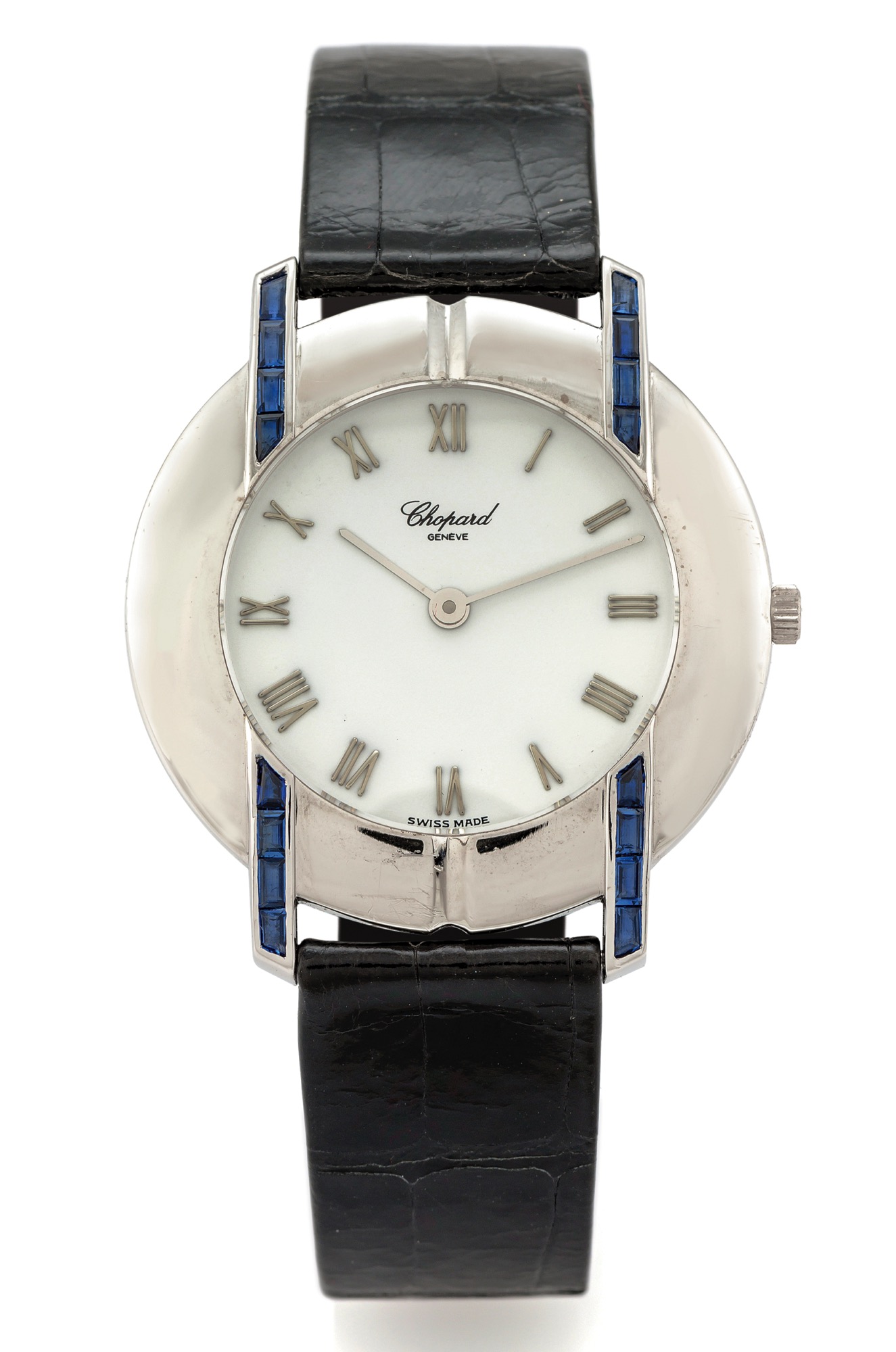 CHOPARD BAGUETTE SAPPHIRE WHITE GOLD 
Chopard, Geneve, case No. 472105, Ref. 16/3270. 
Very fine and elegant, 18K white gold & baguette 
sapphire, quartz wristwatch with a stainless steel 
Chopard buckle.