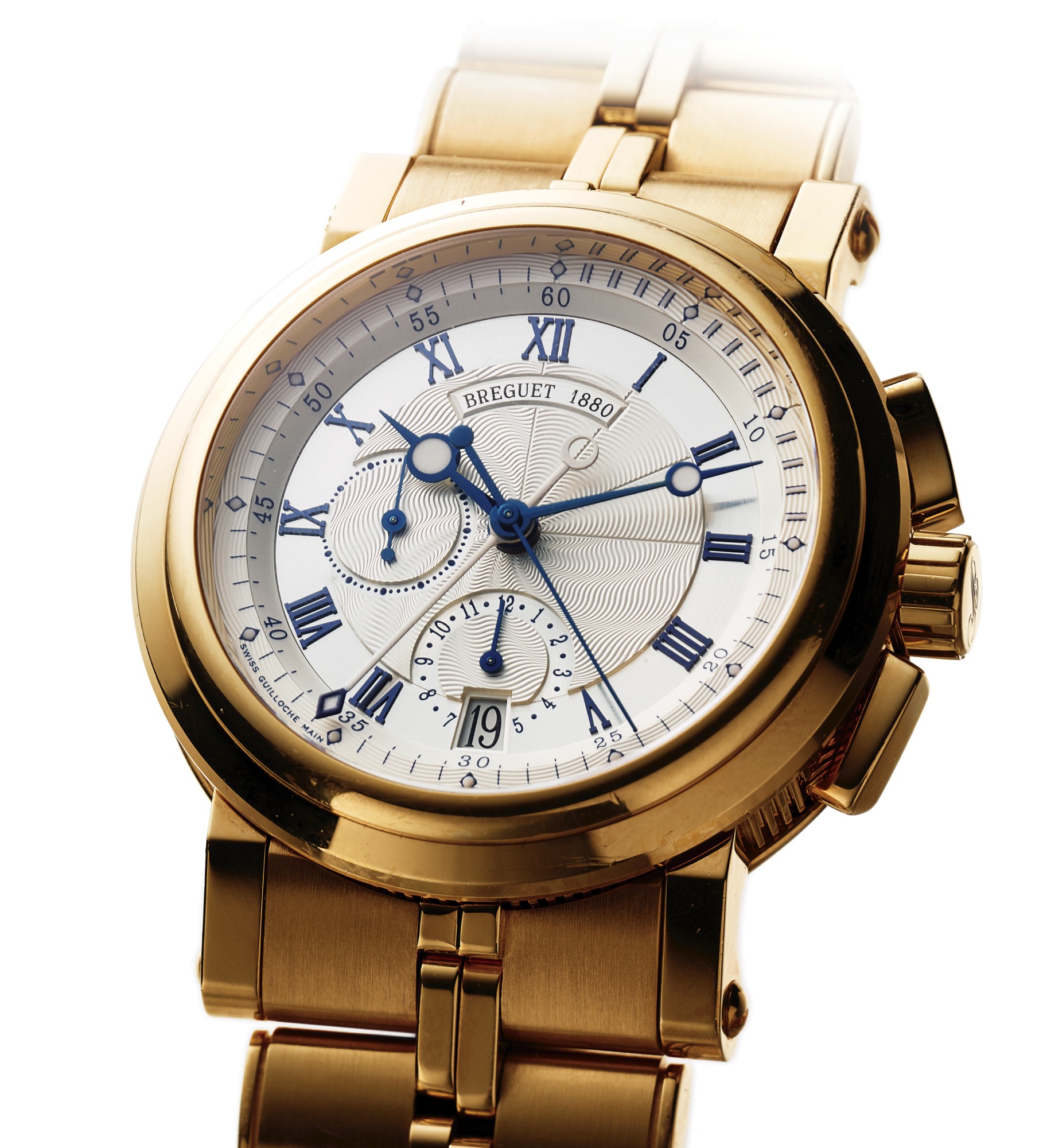 BREGUET REF. 5827 MARINE CHRONOGRAPH YELLOW GOLD 
Breguet, Horloger de la Marine, "Marine", No. 1880, Ref. 5827. 
Very fine, large, self-winding, water-resistant, 18K yellow gold wristwatch with curved-rectangular 
button chronograph, central instantaneous 60-minute register hand, 12-hour register, date and an 
18K yellow gold Breguet link bracelet with deployant clasp. Accompanied by an extra Breguet strap 
with 18K yellow gold Breguet deployant clasp.