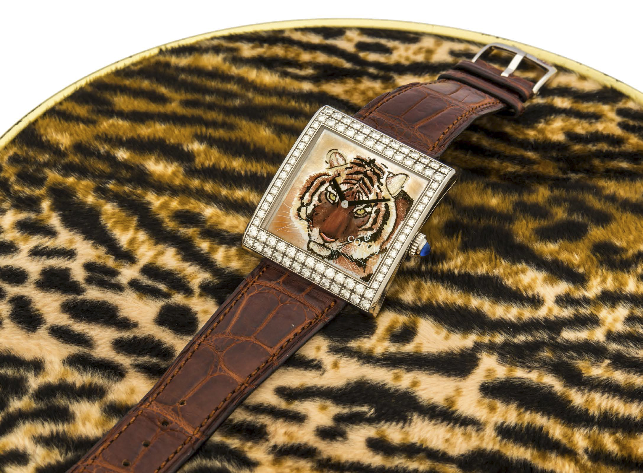 CORUM BUCKINGHAM REF. 055.182.69 WHITE GOLD AND DIAMONDS LIMITED EDITION, 18/50 A very fine manual-winding 18K white gold diamond-set wristwatch with mother-of pearl dial with tiger painting.