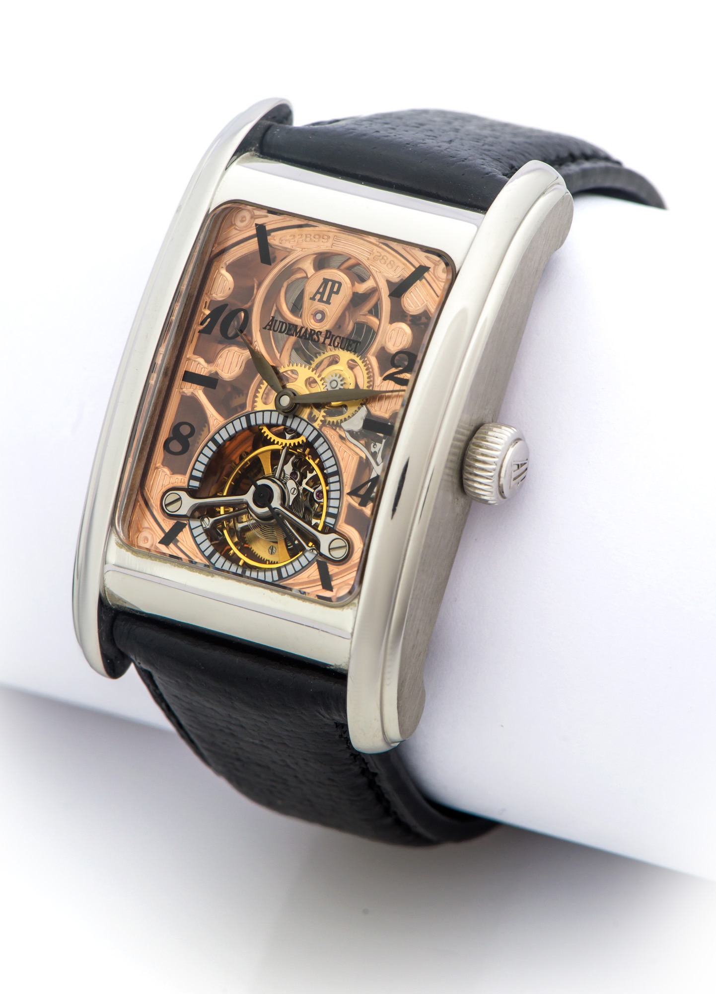 AUDEMARS PIGUET EDWARD PIGUET TOURBILLON SKELETON PLATINUM 
Audemars Piguet, Edward Piguet Tourbillon, case No.F25520, movement No.622899. Made in 
2010s.
Very fine and rare, rectangular curved, manual-winding, water-resistant, platinum wristwatch with visible one-minute tourbillon regulator, skeletonized movement.