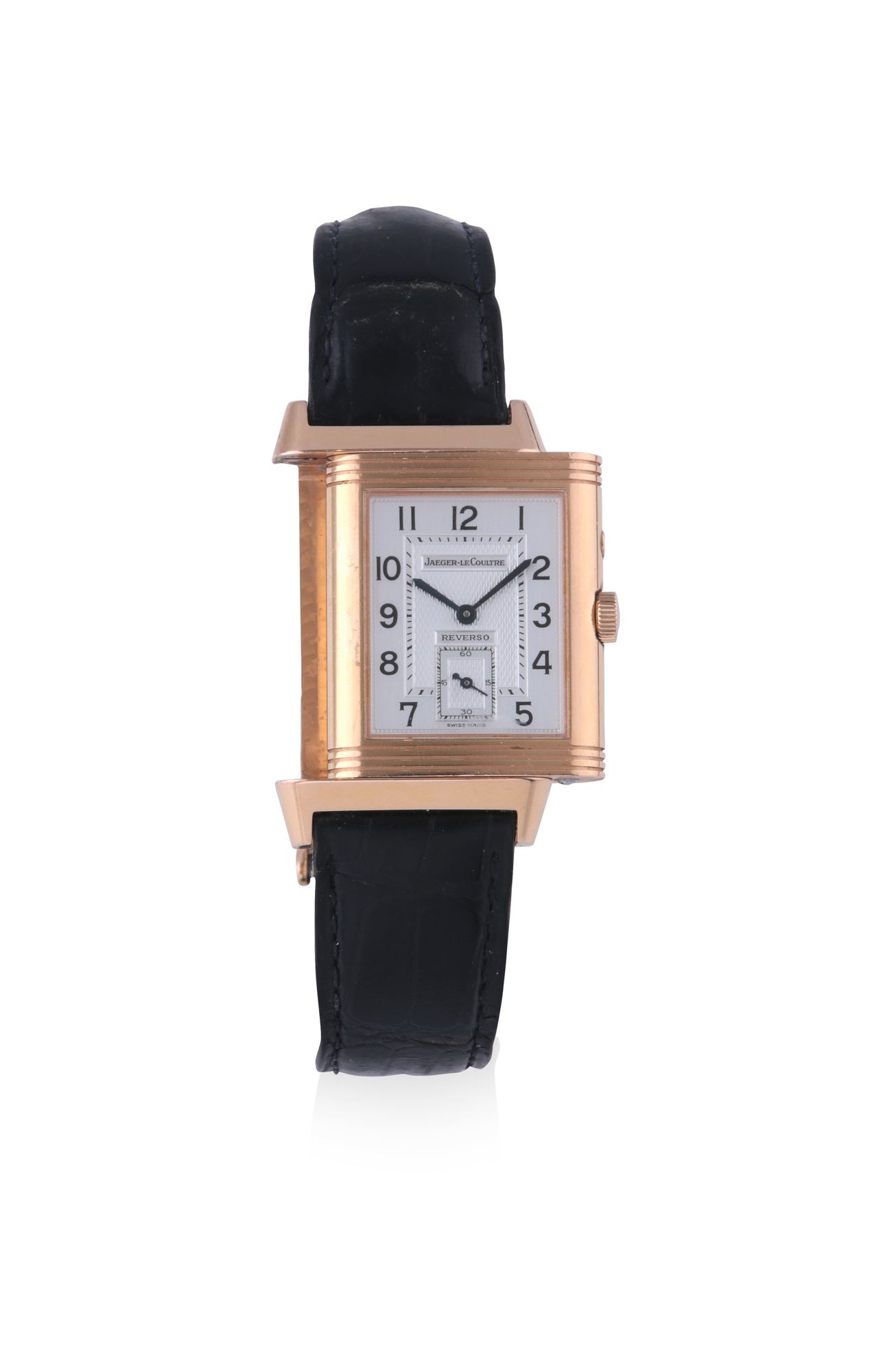 JAEGER LECOULTRE DUOFACE PINK GOLD 
Jaeger Lecoultre, Duoface, ref. 272.2.54. Made circa 2000's 
Fine 18k pink gold rectangular reversible manual winding wristwatch with 2time zones. Black and silver dial. And an 18k pink gold deployant clasp. 
Belle montre bracelet en or rose. Boîtier rectangle reversible. Au recto, cadranargent avec petite trotteuse à 6 heures. Aiguilles en acier bleui. Au verso,
cadran gris anthracite avec aiguilles et chiffres arabes luminescents. Indication 
24h à 6 he
