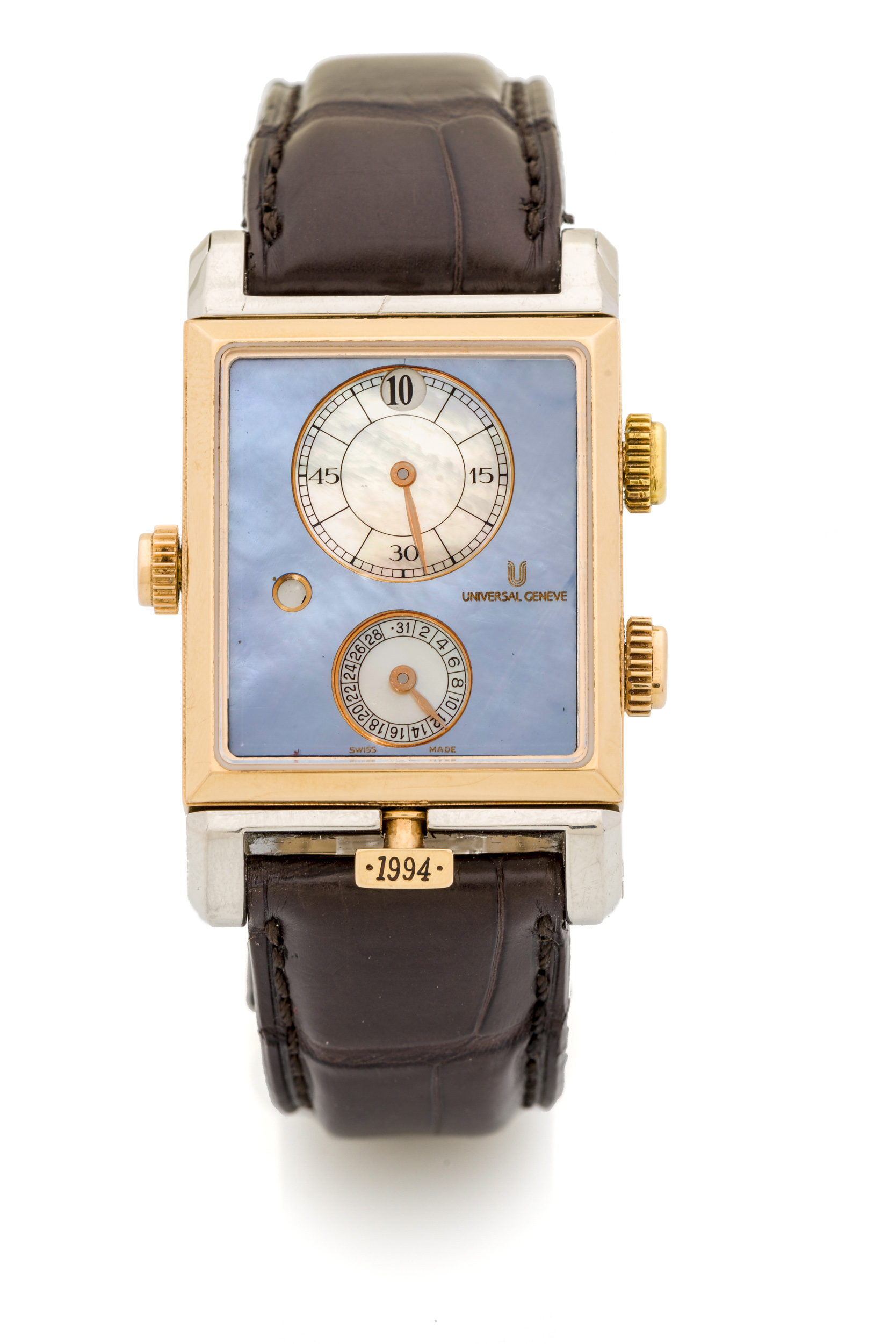 UNIVERSAL GENEVE GOLDEN JANUS CABRIOLET MODELE UNIQUE A fine and very rare manual winding platinium and 18k pink gold rectangular reversible wristwatch with jump hour, day/night indication and date. Mother of pear dial. Made for the 100th anniversary of Universal geneve.