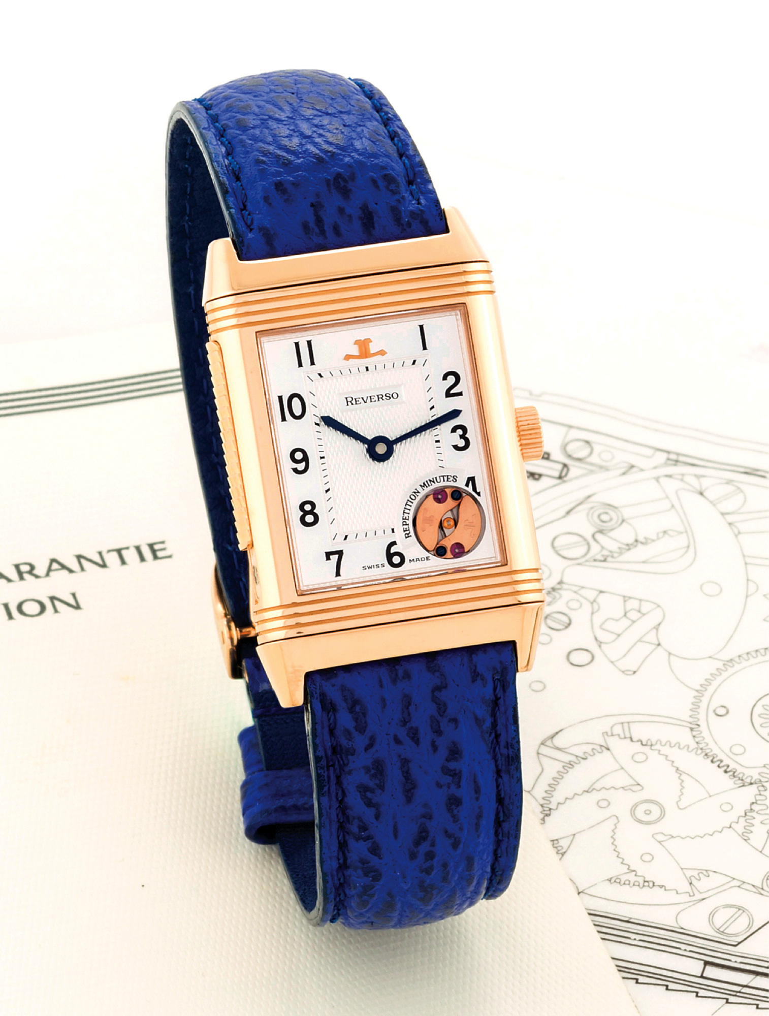 JAEGER-LECOULTRE REF. 270.2.73 MINUTE REPEATING REVERSO 
Jaeger-LeCoultre, "Reverso Répétition Minutes", No. 011/500, Ref. 270.2.73. Made in a limited edition of 
500 pieces in 1994. 
Very fine and rare, rectangular, minute repeating, 18K pink gold reversible wristwatch with an 18K pink 
gold Jaeger-leCoultre deployant clasp. Accompanied by the blank Certificate and service certificates.