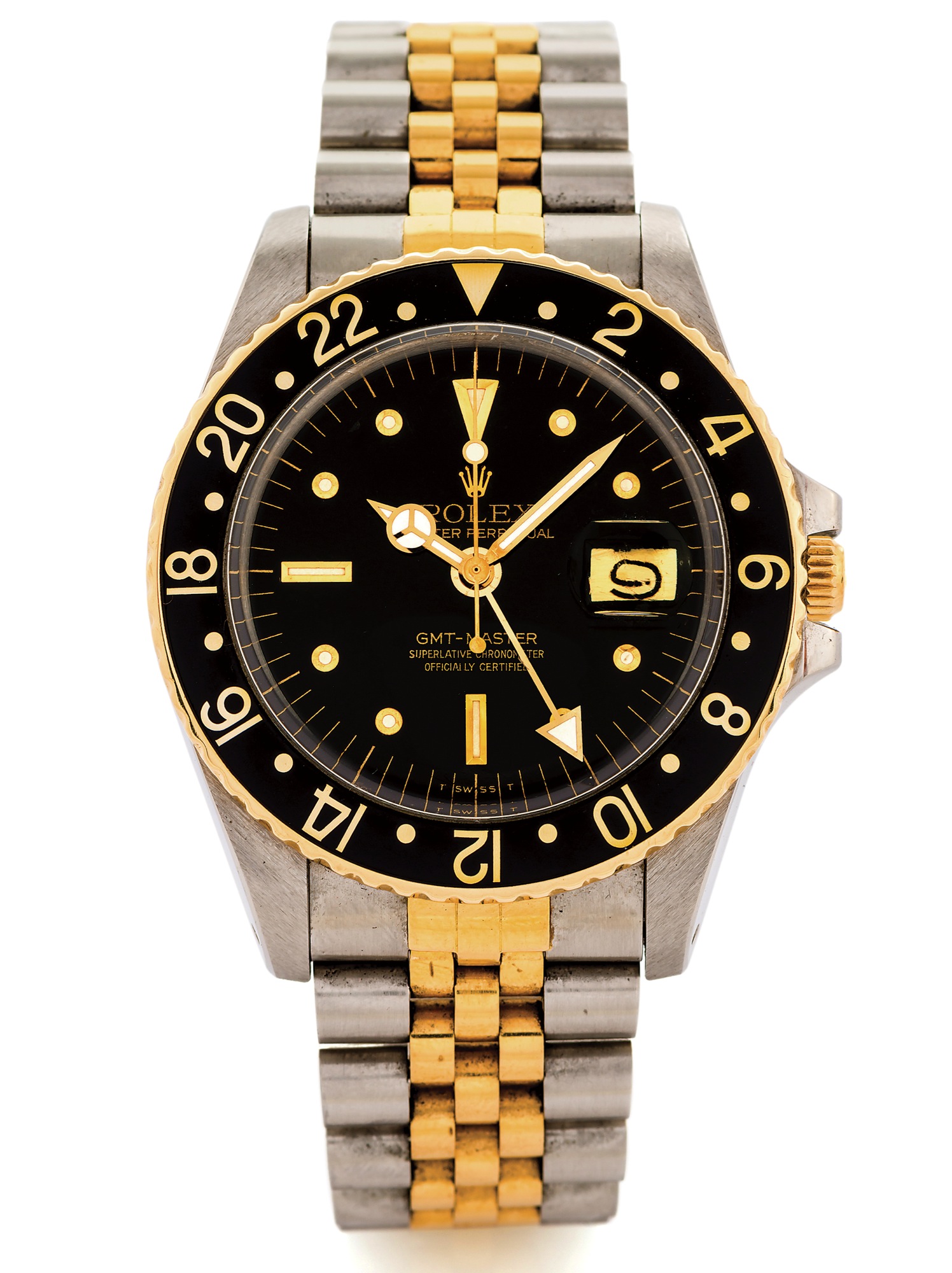 ROLEX REF. 1675 GMT-MASTER STEEL AND GOLD 
Rolex, Oyster Perpetual, GMT-Master, Superlative Chronometer, 
Officially Certified, case No. 5452407. Made in 1978. 
Fine, two time zone, center seconds, self-winding, water- resistant, 
stainless steel and 18K yellow gold Chronometer wristwatch with date, 24-hour bezel and hand and a steel and yellow 
gold Rolex Jubilee bracelet with deployant clasp.