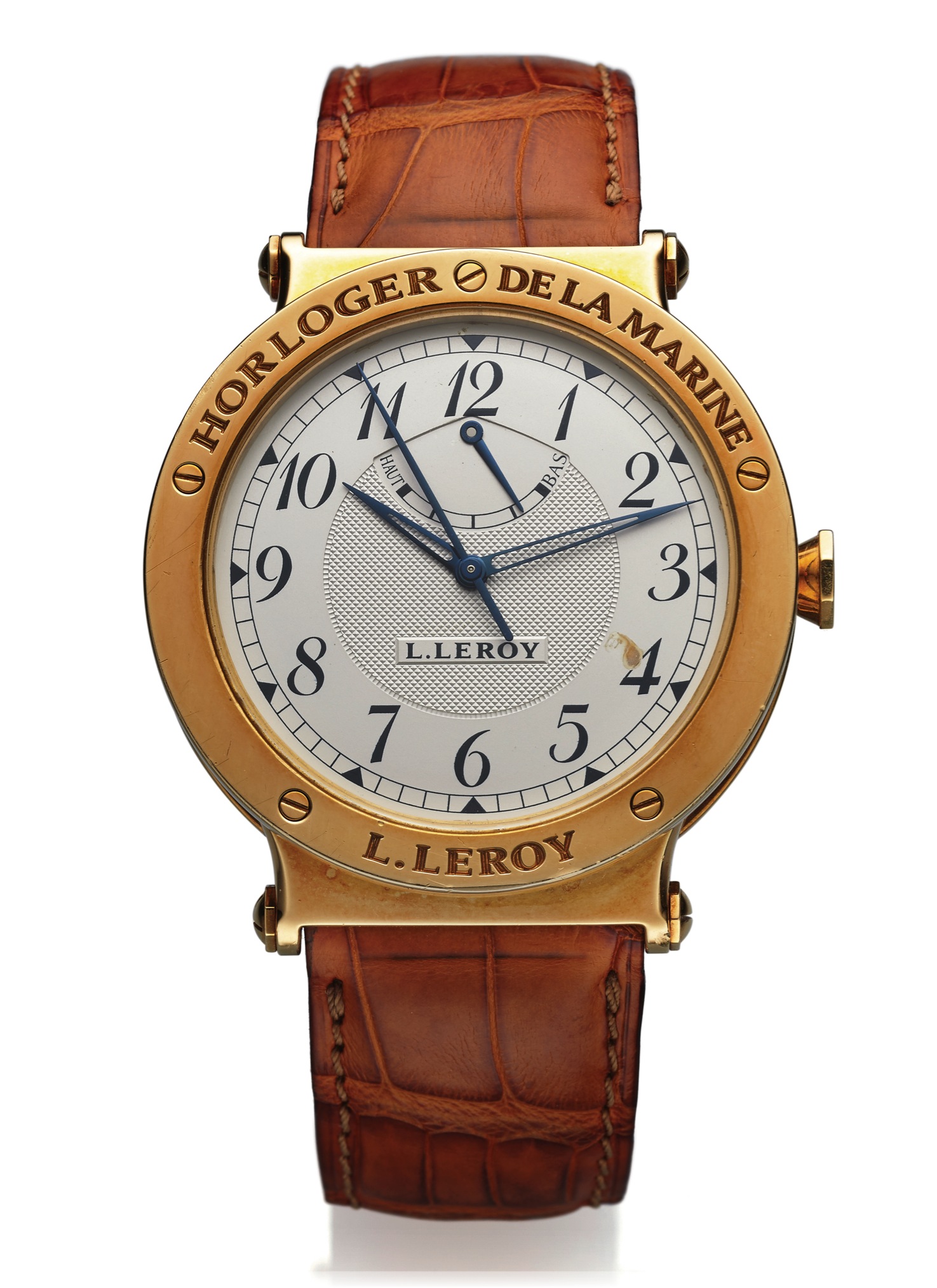 L.LEROY AUTOMATIC 
POWER RESERVE YELLOW GOLD 
L. Leroy, "Horologer de la Marine," "Chronometre Control 
Automatique," case No. 01LA0018. Made in the 2000's. 
Fine, center seconds. self-winding, water-resistant, 
Chronometer wristwatch with power reserve and a yellow 
gold Leroy buckle.