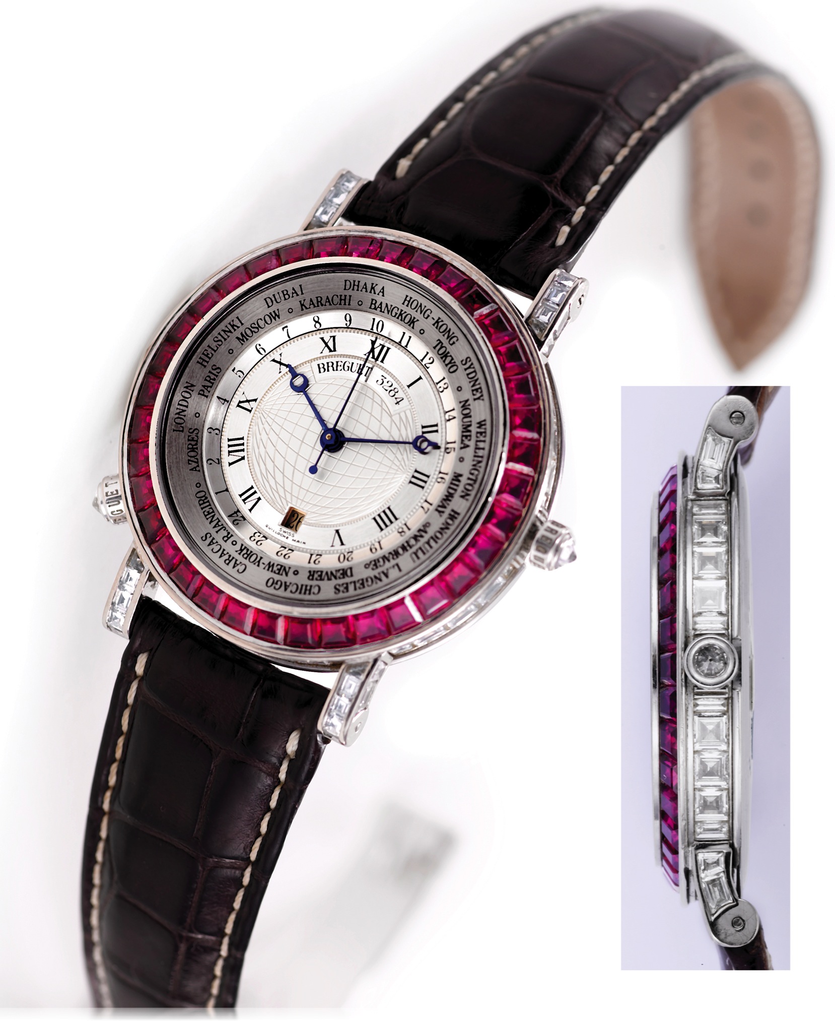 BREGUET REF. 3701 MARINE HORA MUNDI 
BAGUETTE WHITE GOLD
DIAMONDS AND RUBIES 
Breguet, "Marine Hora Mundi, Automatique", No. 3284E, 
Ref. 3701. Made circa 1990. 
Very fine and rare, World Time, center-seconds, self-winding, 
water-resistant, 18K white gold, ruby and diamond wristwatch with 42-hour autonomy, date and 24 hours, and an 18K white 
gold Breguet deployant clasp.