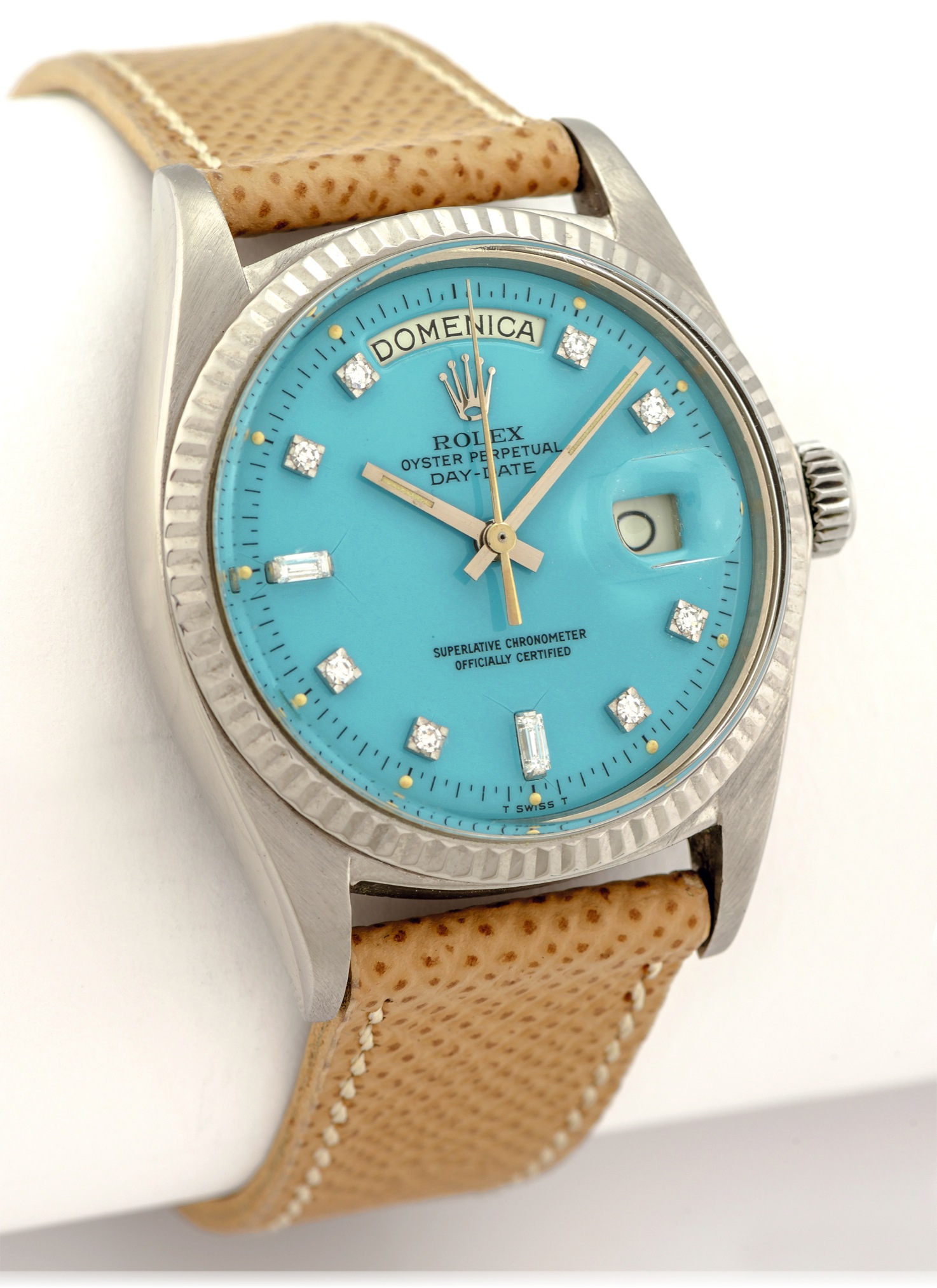 ROLEX REF. 1803 STELLA BABY BLUE STELLA DIAL
DIAMOND INDEXES WHITE GOLD 
Rolex, Oyster Perpetual, Day-Date, Superlative Chronometer Officially Certified, case No. 2462510, 
Ref. 1803. Made in 1970. 
Very fine and unusual, center seconds, self-winding, 18K white gold Chronometer wristwatch with 
day & date and a Lacquered Stella light blue dial.