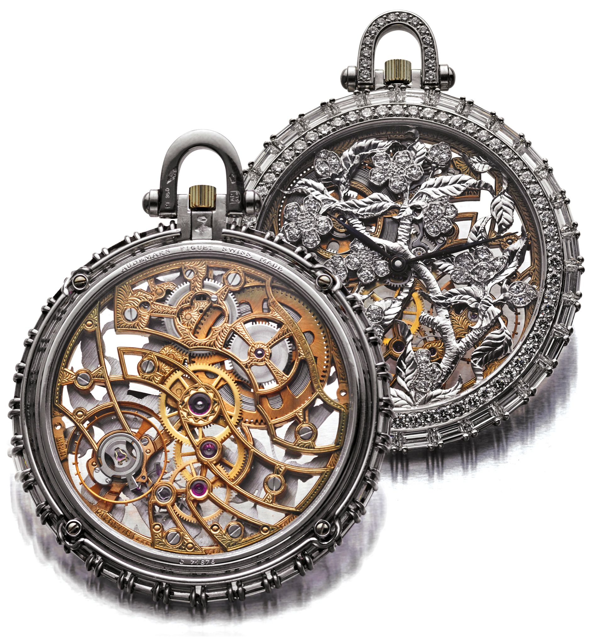 AUDEMARS PIGUET BRANCH 
WITH FLOWER
DIAMOND AND PLATINUM
Audemars Piguet, Genève, ''Branch with Flower'', No. 263778, 
case No. C 71676, Ref. 35783. Sold on January 1991. 
Very fine, extremely rare and highly impressive platinum and 
diamond set skeletonized dress watch. Accompanied by a fitted 
box, Certificate of Origin and hang tag.