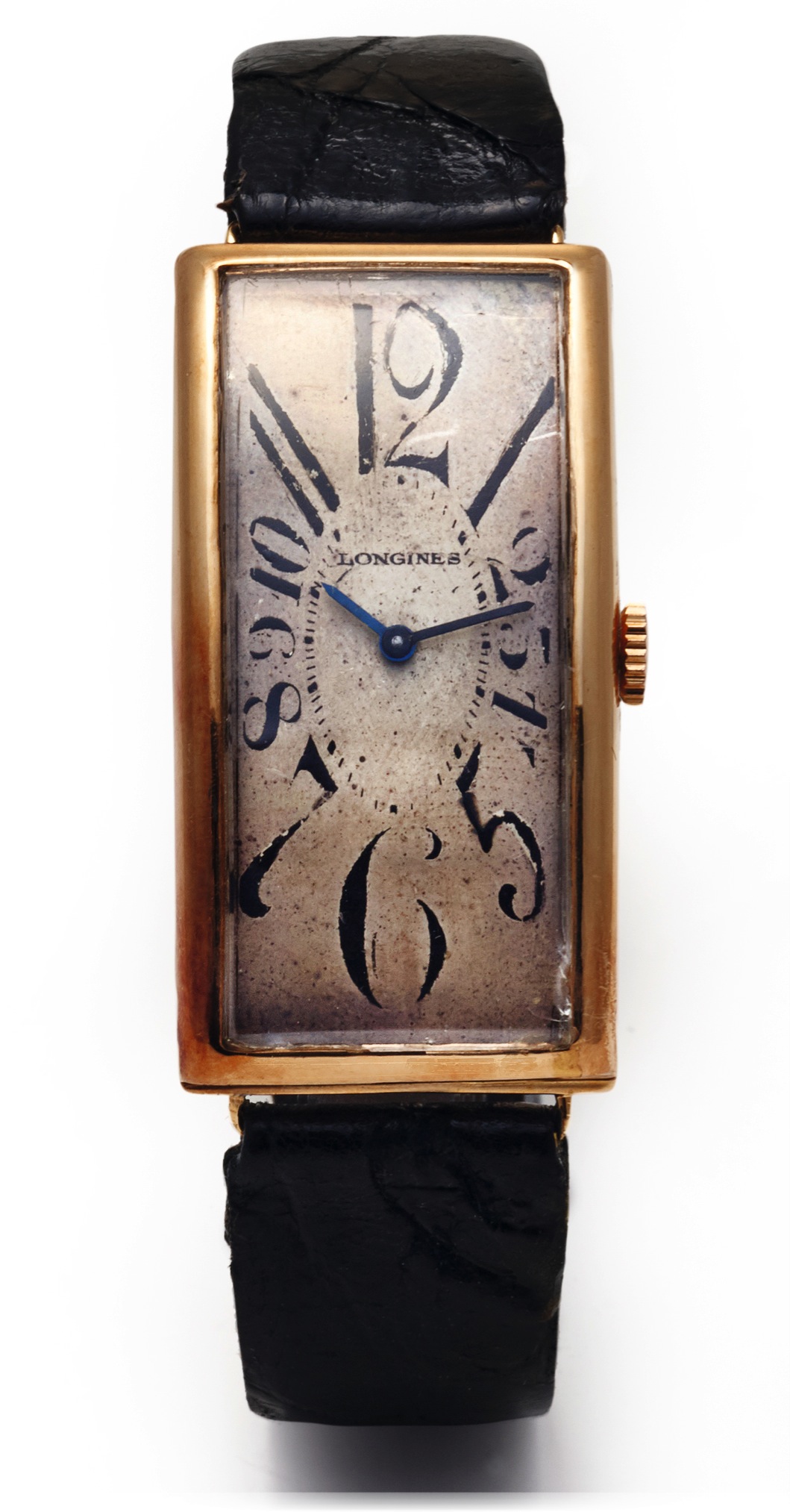 LONGINES ART DECO YELLOW GOLD 
Longines, No. 3076414 . Made circa 1920's. 
Fine and very rare, large, rectangular curved, 18K yellow 
gold Art Deco wristwatch.