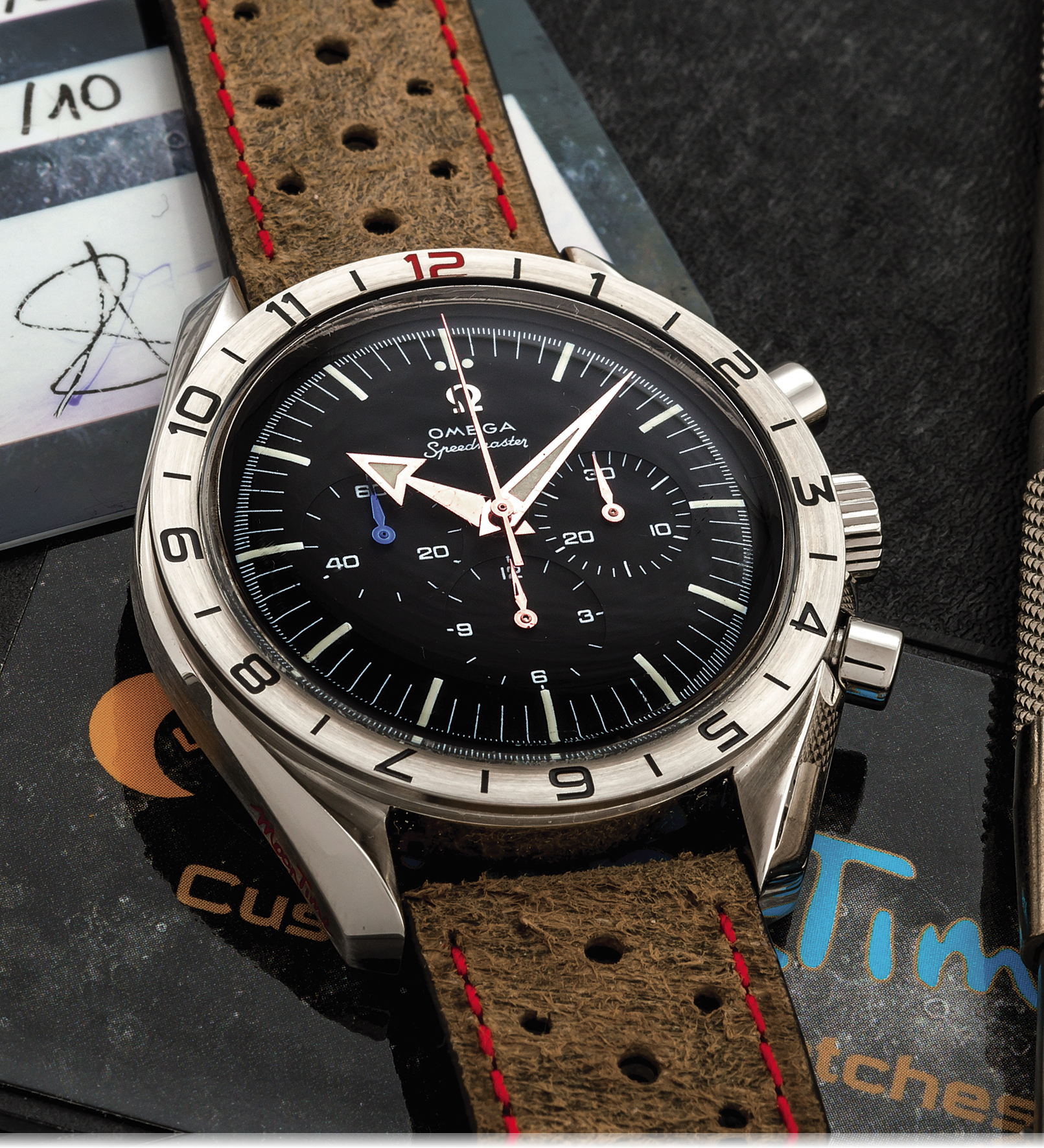 OMEGA SPEEDMASTER 
CUSTOMIZED BY MOONTIME NO. 01/10 
Omega, "Speedmaster", MoonTime, No. 01/10, No. 77007201, Ref. ST 
145.0222. Made in a limited edition of 10 pieces circa 2005. 
Fine, asymmetric, water-resistant, stainless steel gentleman`s 
wristwatch with round-button chronograph, registers and a 
stainless steel wristwatch with Omega buckle. Accompanied by a 
plastic custom suitcase with Moontime warranty card, spare Omega 
stainless steel bracelet and strap changing tool.