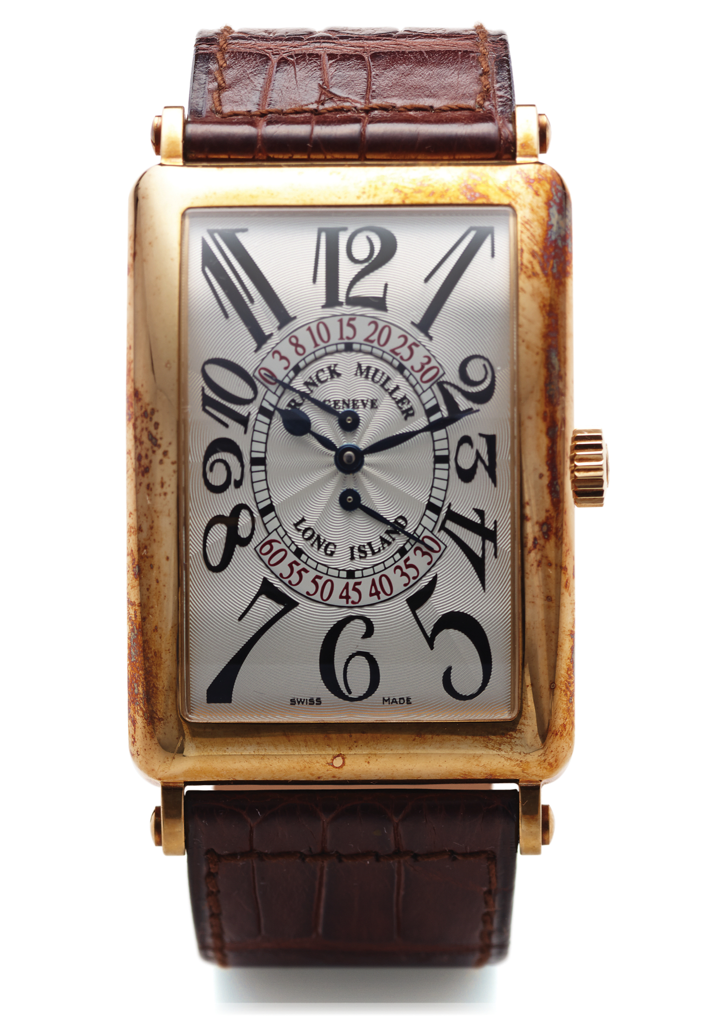 FRANCK MULLER REF. 1100 DSR 
LONG ISLAND DOUBLE RETROGRADE YELLOW GOLD 
Franck Muller, Genève, "Long Island - Double Retrograde Seconds," 
No. 237, Ref. 1100 DS R. Made in the 2000s. 
Very fine, large, rectangular curved, self-winding, water resistant, 
18K yellow gold wristwatch with double retrograde seconds and an 
18K yellow gold Franck Muller buckle. Accompanied by a fitted box 
and warranty.