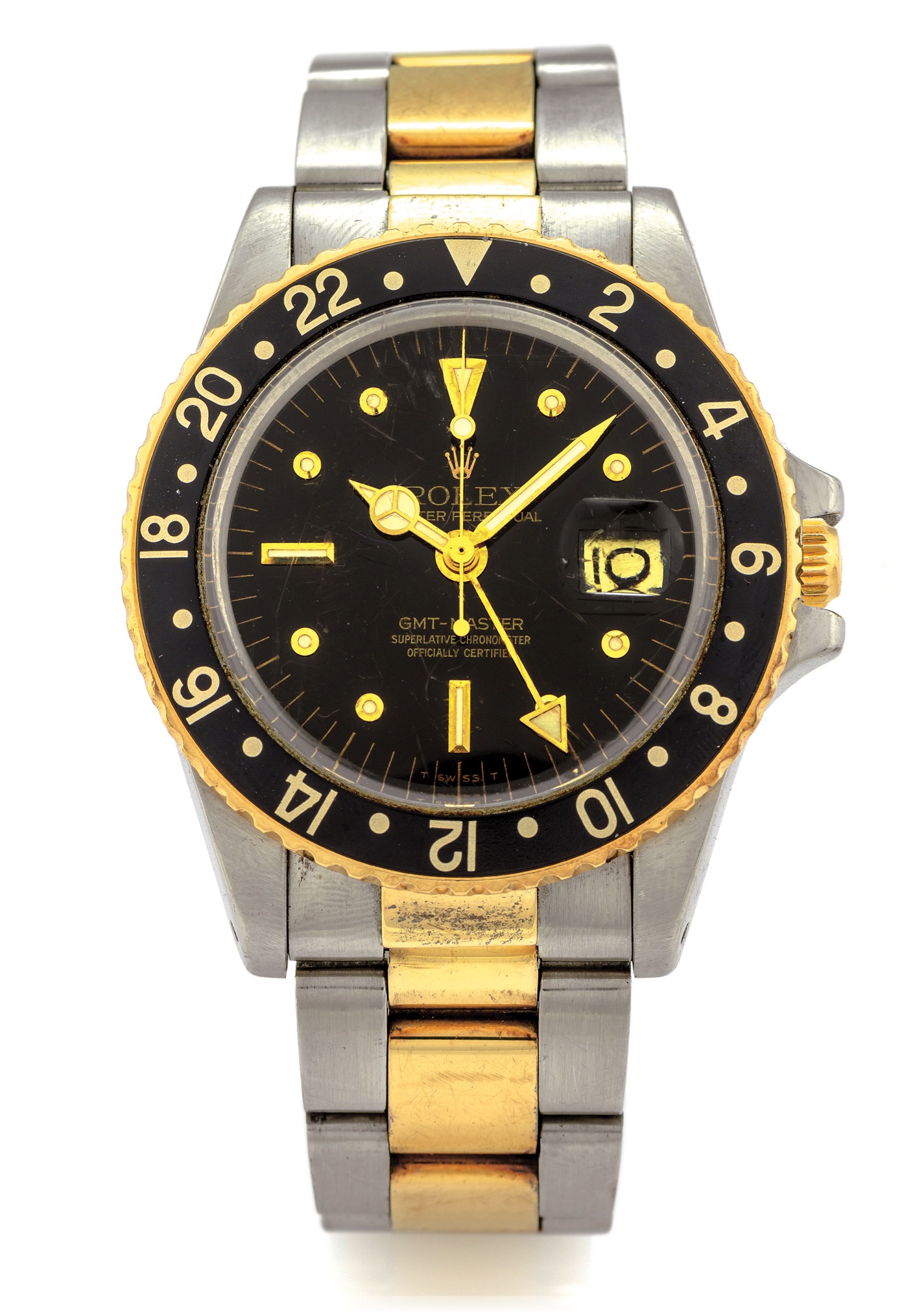 ROLEX REF. 1675 GMT-MASTER STEEL AND GOLD 
Rolex, Oyster Perpetual, GMT-Master, Superlative Chronometer, 
Officially Certified, case No. 5873233. Made in 1978. 
Fine, two time zone, center seconds, self-winding, water- resistant, 
stainless steel and 18K yellow gold Chronometer wristwatch with 
date, 24-hour bezel and hand and a steel and yellow gold Rolex 
Jubilee bracelet with deployant clasp.