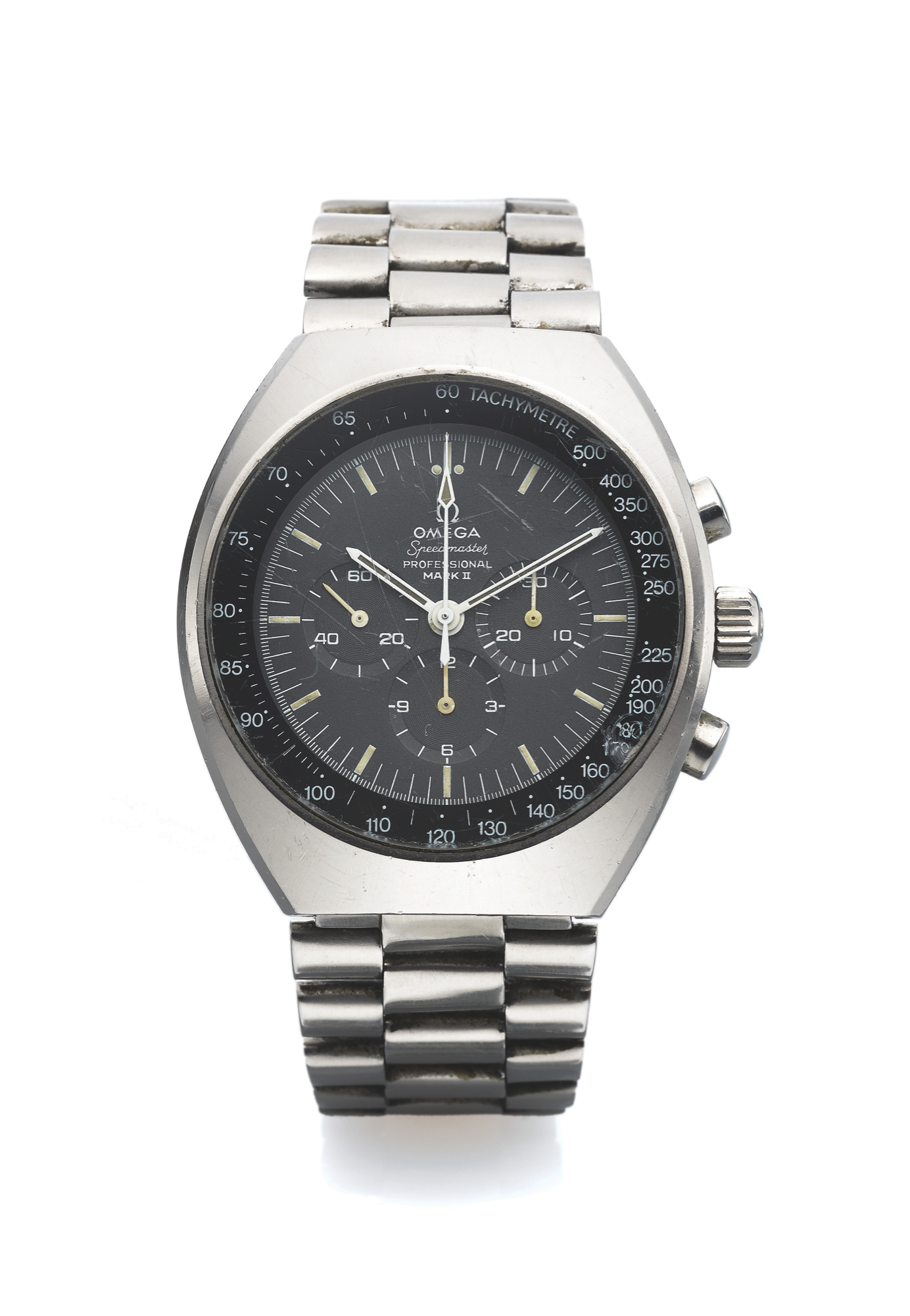 OMEGA SPEEDMASTER MARK II
Omega, Speedmaster Professional, Mark II, No. 28085175,
Ref. ST 145.014. Made circa 1970.
Fine, tonneau-shaped, self-winding, stainless steel wristwatch
with round button chronograph, registers, tachometer and a
stainless steel Omega link bracelet with deployant clasp.
