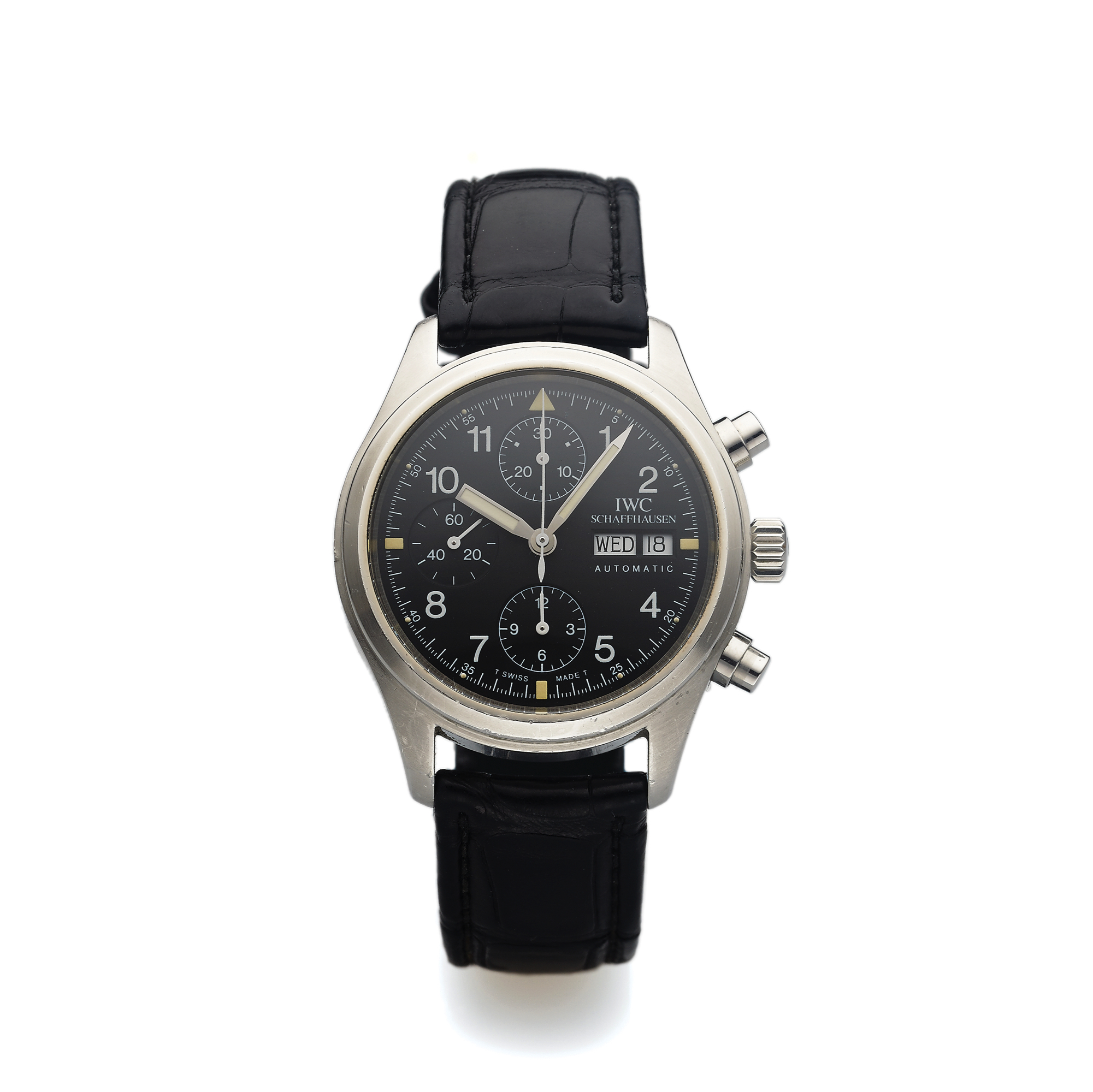 IWC, REF. 3706 DER FLIEGERCHRONOGRAPH
International Watch Co., Schaffhausen, "Der Fliegerchronograph"
(The Aviator Chronograph), case No. 2625931, Ref. 3706. Made
in the 2000's.
Fine, self-winding, water-resistant, antimagnetic, stainless
steel wristwatch with round button chronograph, registers,
day and date and a stainless steel IWC buckle. Accompanied by
a stainless steel IWC link bracelet with deployant clasp and 2
setting pins.