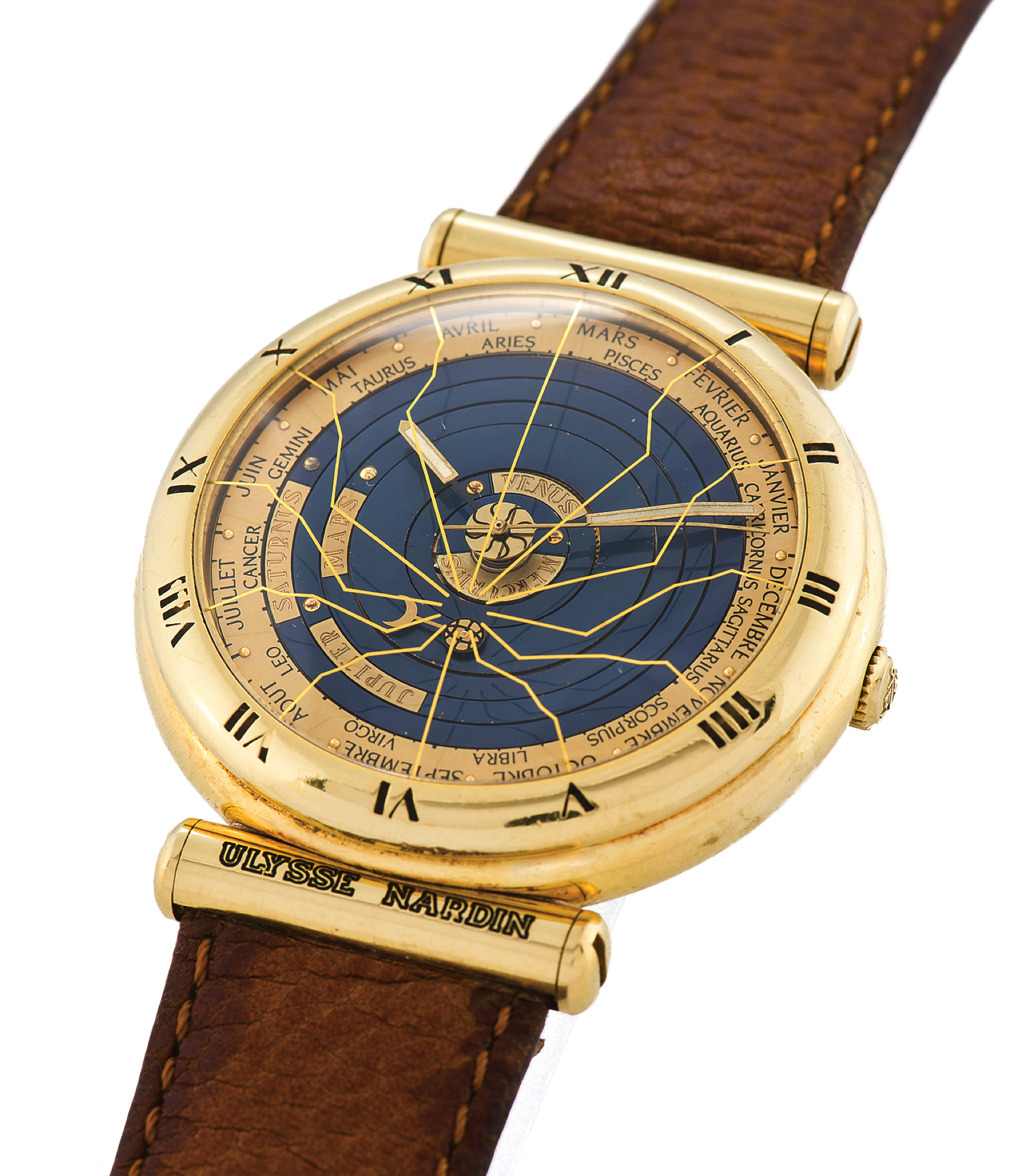 ULYSSE NARDIN REF. 801-22 YELLOW GOLD PLANETARIUM COPERNICUS 
Ulysse Nardin, Locle, Suisse, "Planetarium Copernicus", Ref. 801-22. Made in the 1990s. 
Fine and unusual, astronomic, self-winding, water-resistant, 18K yellow gold wristwatch with 
functions of the planetary cycle, days, months, zodiac signs and moon phases, with an 18K yellow 
gold Ulysse Nardin buckle.
