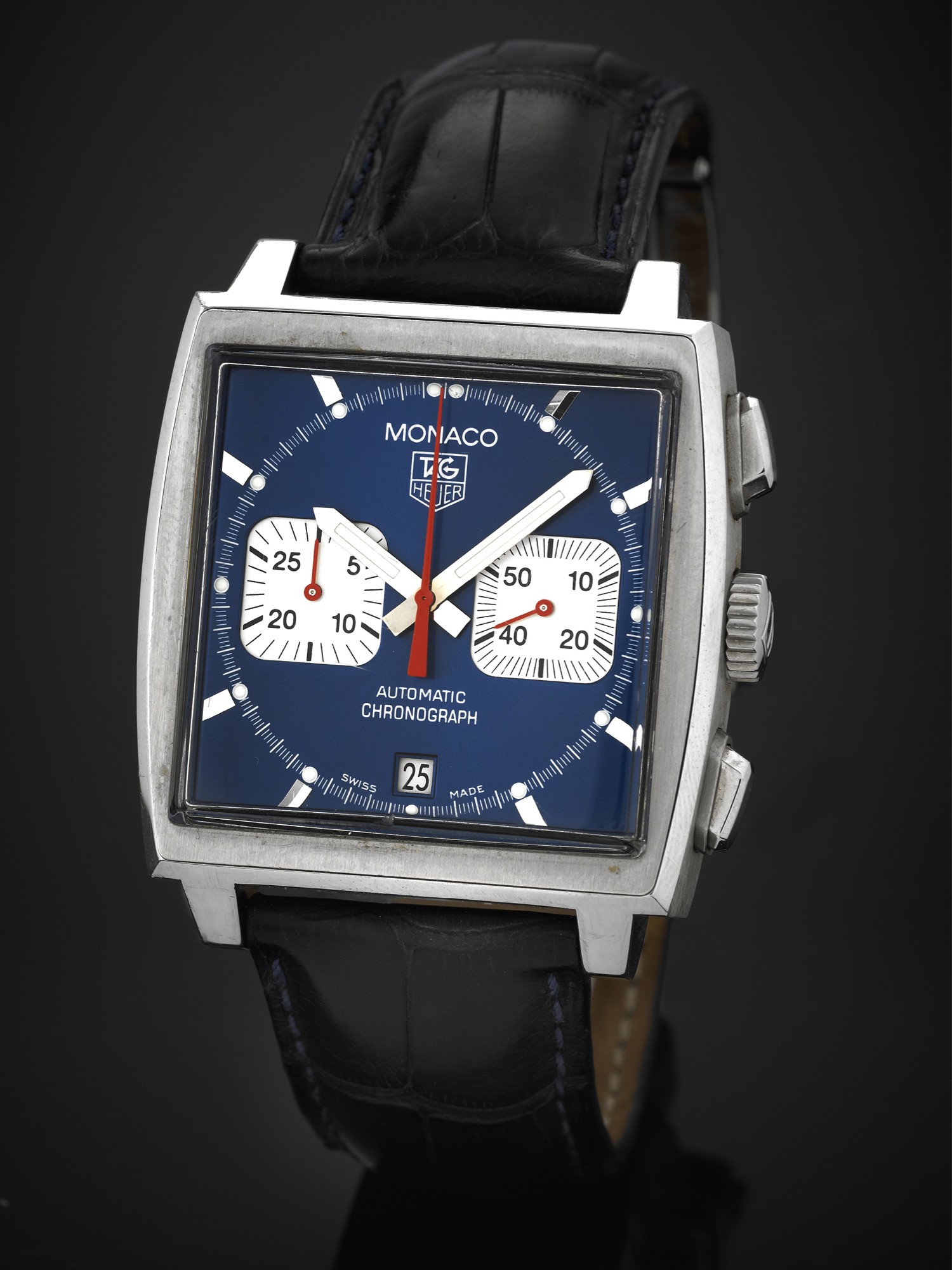 TAG HEUER, REF. 2113, MONACO CHRONOGRAPH
Tag Heuer, Monaco, case No. XU 8789, Ref. CW2113-0. Made
in the 1990s.
Fine and unusual, square convex, water resistant, self-winding
stainless steel wristwatch with square button chronograph,
registers, date and a stainless steel Tag Heuer deployant clasp.