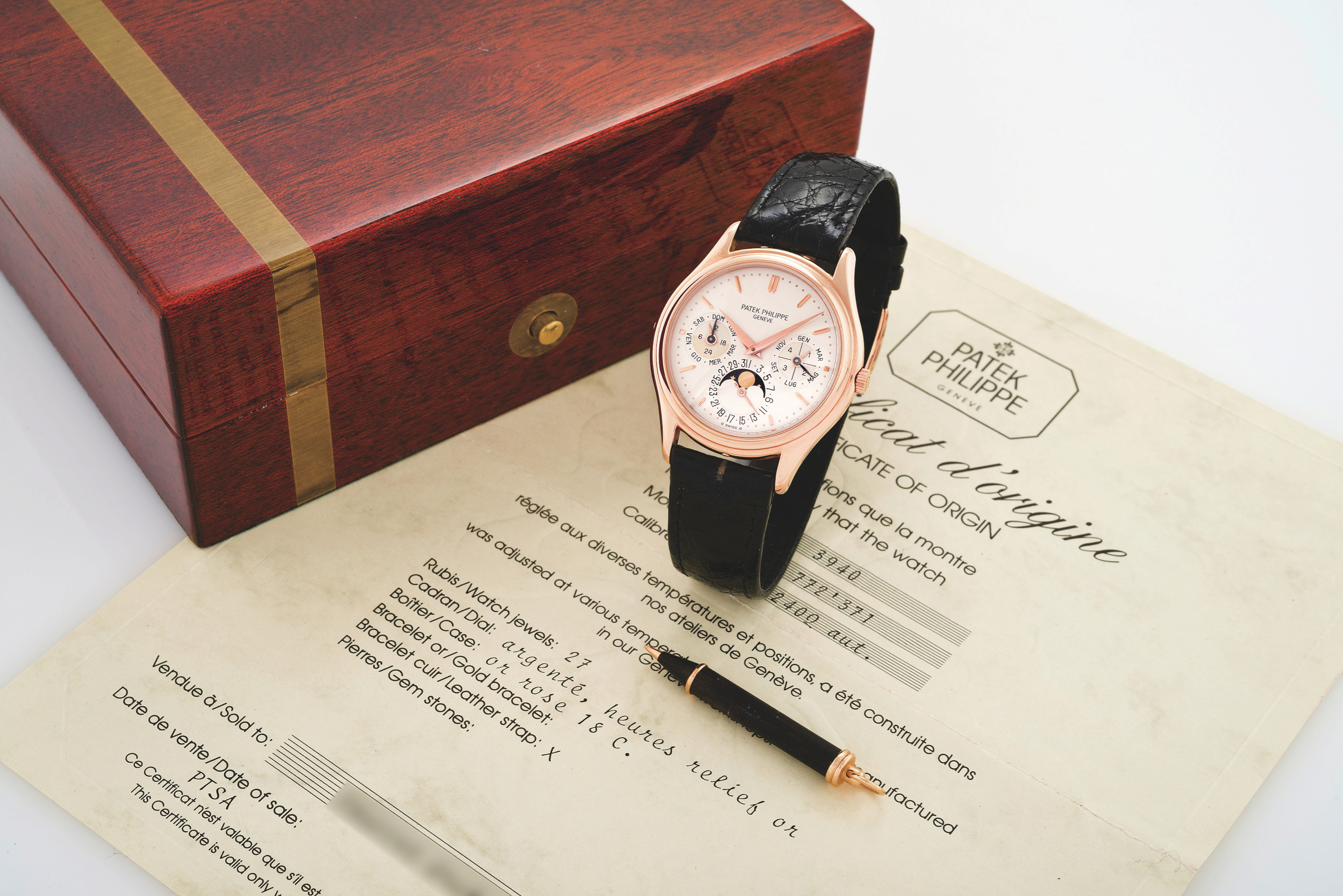 PATEK PHILIPPE REF 3940 PINK GOLD
Patek Philippe, Genève, movement No. 772371, Ref. 3940.
Made circa 1980.
Very fine, self-winding, 18K pink gold wristwatch with
perpetual calendar, moon phases and an 18K pink gold
Patek Philippe buckle. Accompanied by a fitted box,
Certificate and setting pin.