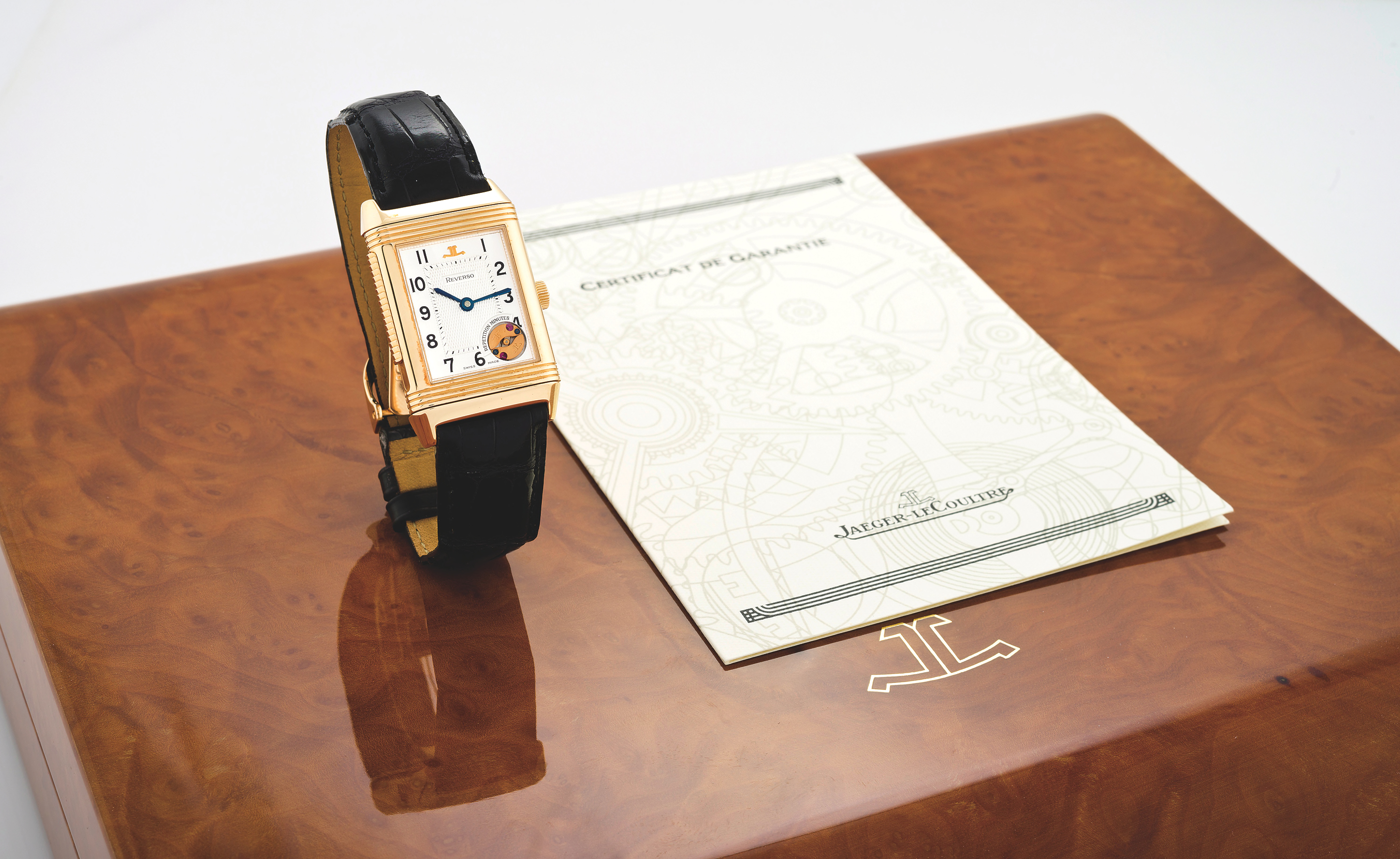 JAEGER-LECOULTRE REF. 270.2.73 MINUTE REPEATING REVERSO
Jaeger-LeCoultre, ?Reverso - Répétition Minute?, No.
340/500, Ref. 270.2.73. Made in a limited edition of 500
pieces, circa 2000.
Very fine and rare, rectangular, minute repeating, 18K pink
gold reversible wristwatch with an 18K pink gold JaegerleCoultre
deployant clasp. Accompanied by the original box,
blank Certificate and instruction booklet.