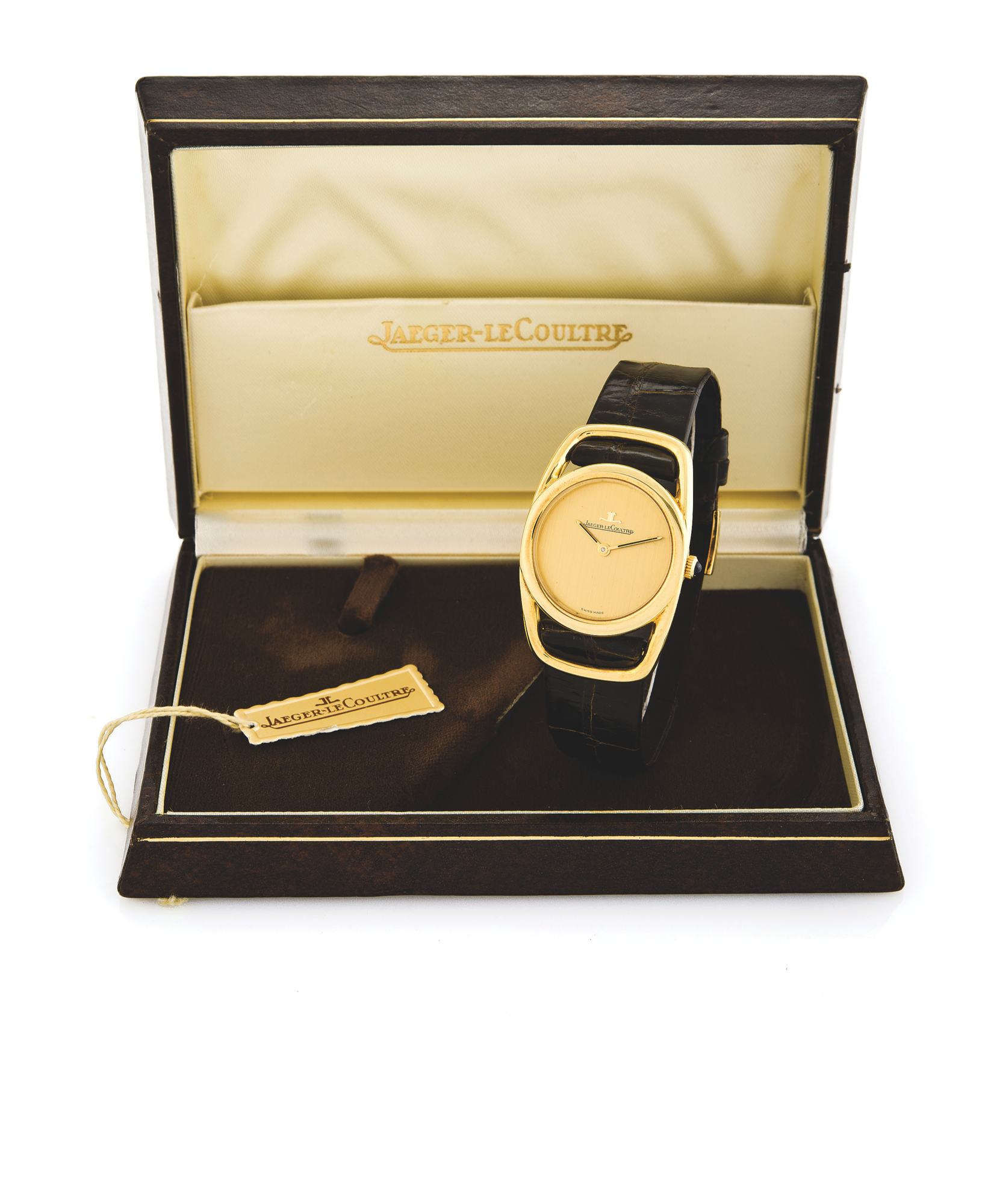JAEGER-LECOULTRE ?ETRIER? YELLOW GOLD
Jaeger-LeCoultre, movement No. 194245, case No. 1372887,
Ref. 9109 21. Made in the 1970s.
Fine and rare, 18K yellow gold wristwatch with a gold-plated Jaeger buckle. Accompanied by a Jaeger-LeCoultre box and guarantee (now void).