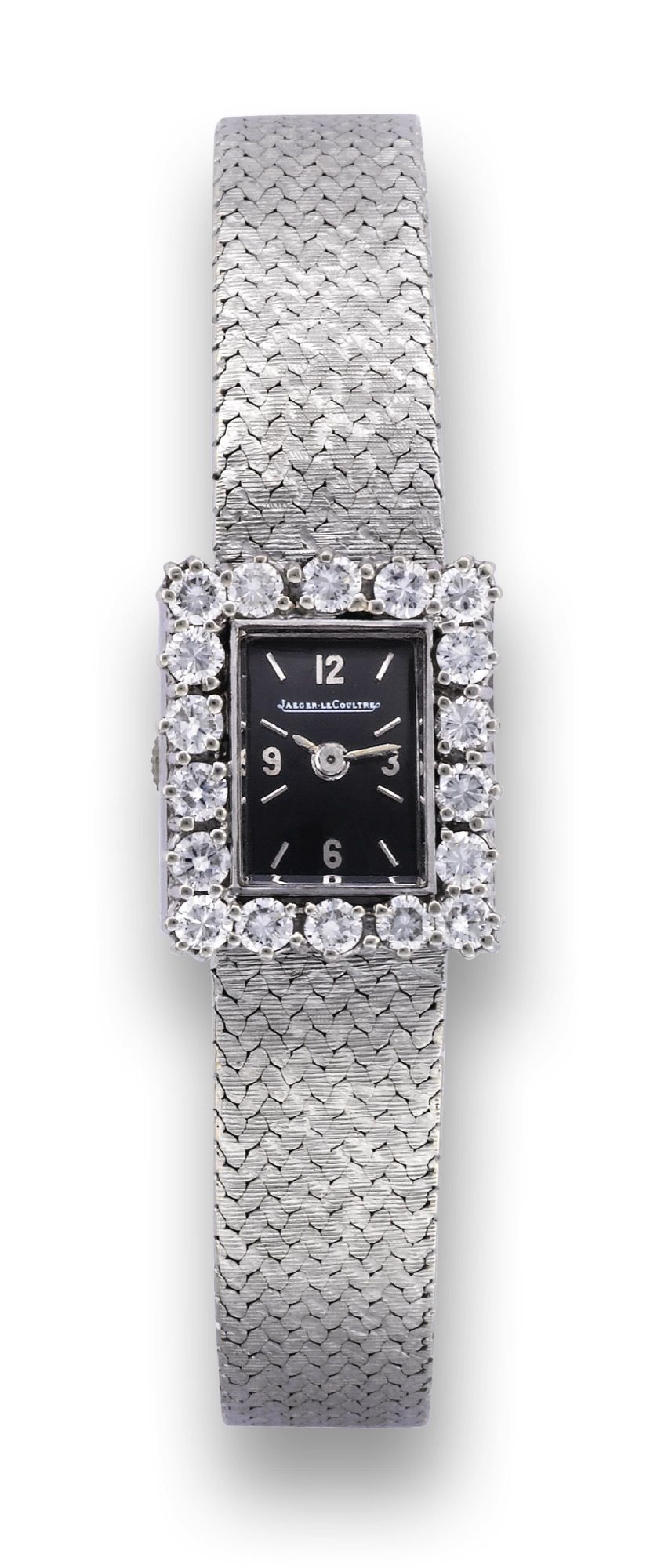 JAEGER LECOULTRE "JOAILLERIE"
Jaeger LeCoultre, ?Joaillerie?, case No. 175650. Made in the 1960's.
Very fine, rectangular, 18K white gold and diamond lady?s wristwatch with an integrated 18k white gold textured
bracelet.