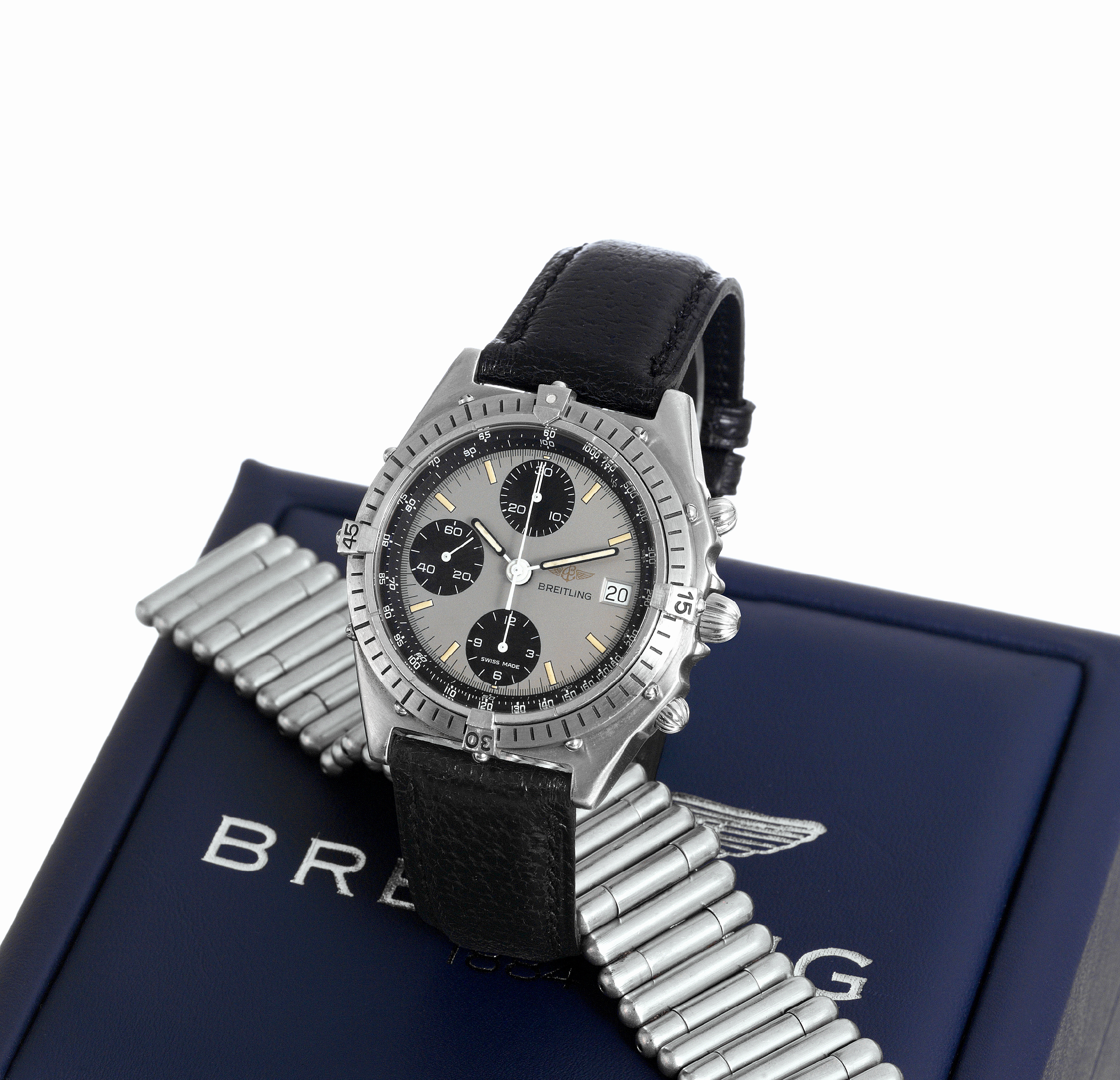 Breitling Chronomat
Breitling, "Chronomat", case No. 81950, Ref. D 13047. Made
in the 1990?s.
Fine, self-winding, water-resistant, stainless steel wristwatch
with date, round button chronograph, registers, tachometer
and a stainless steel Breitling bracelet with concealed
deployant clasp. Accompanied by a Breitling box.