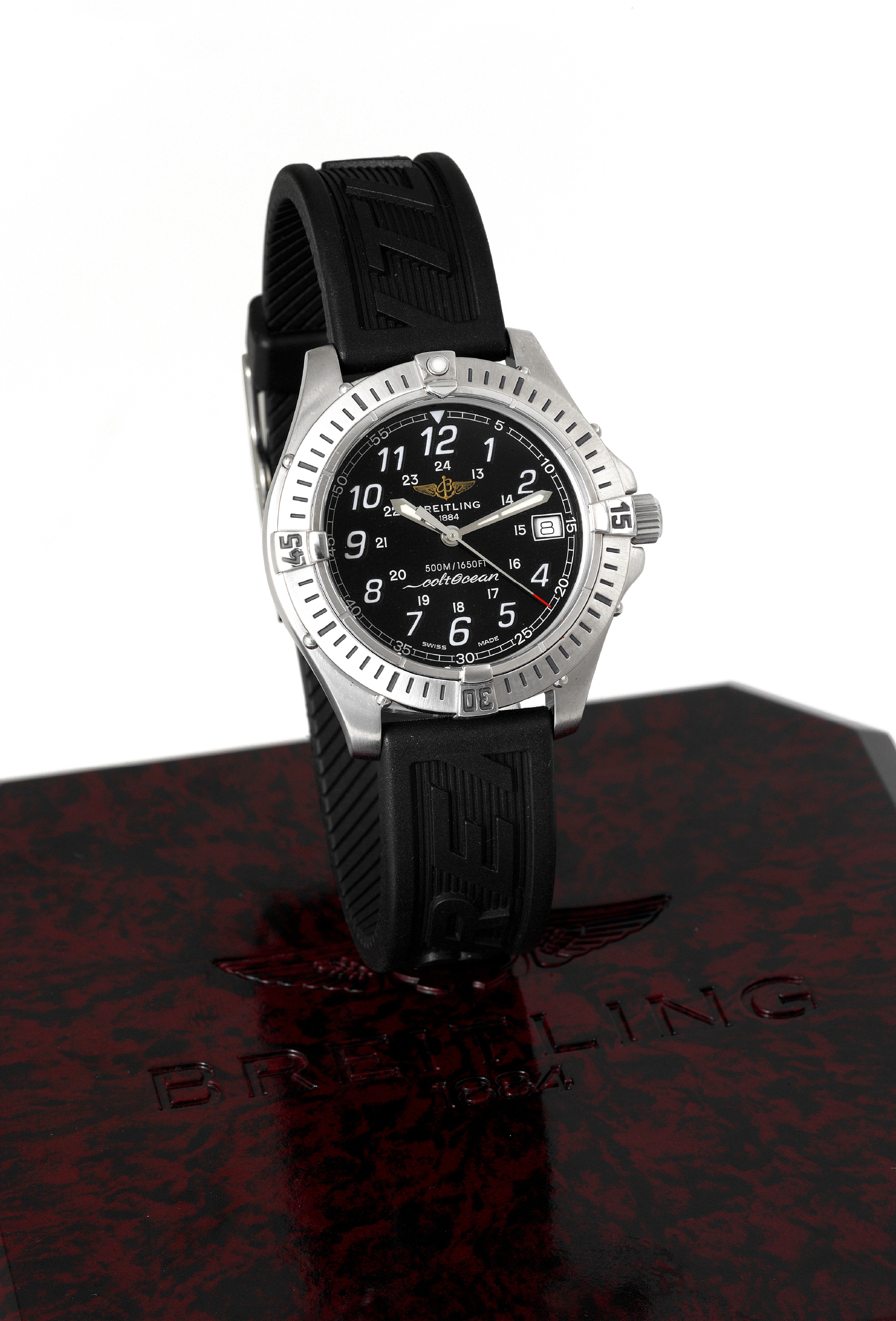 Breitling, 1884 Colt Ocean
Breitling, ?1884 Colt Ocean, Chronomètre, 500m./1650ft.?,
case No. 0478, Ref. A 64050. Made circa 1997.
Fine, center seconds, quartz, water-resistant, stainless steel
diver?s wristwatch with, date and a rubber Breitling strap with
stainless steel buckle. Accompanied by a Breitling box.