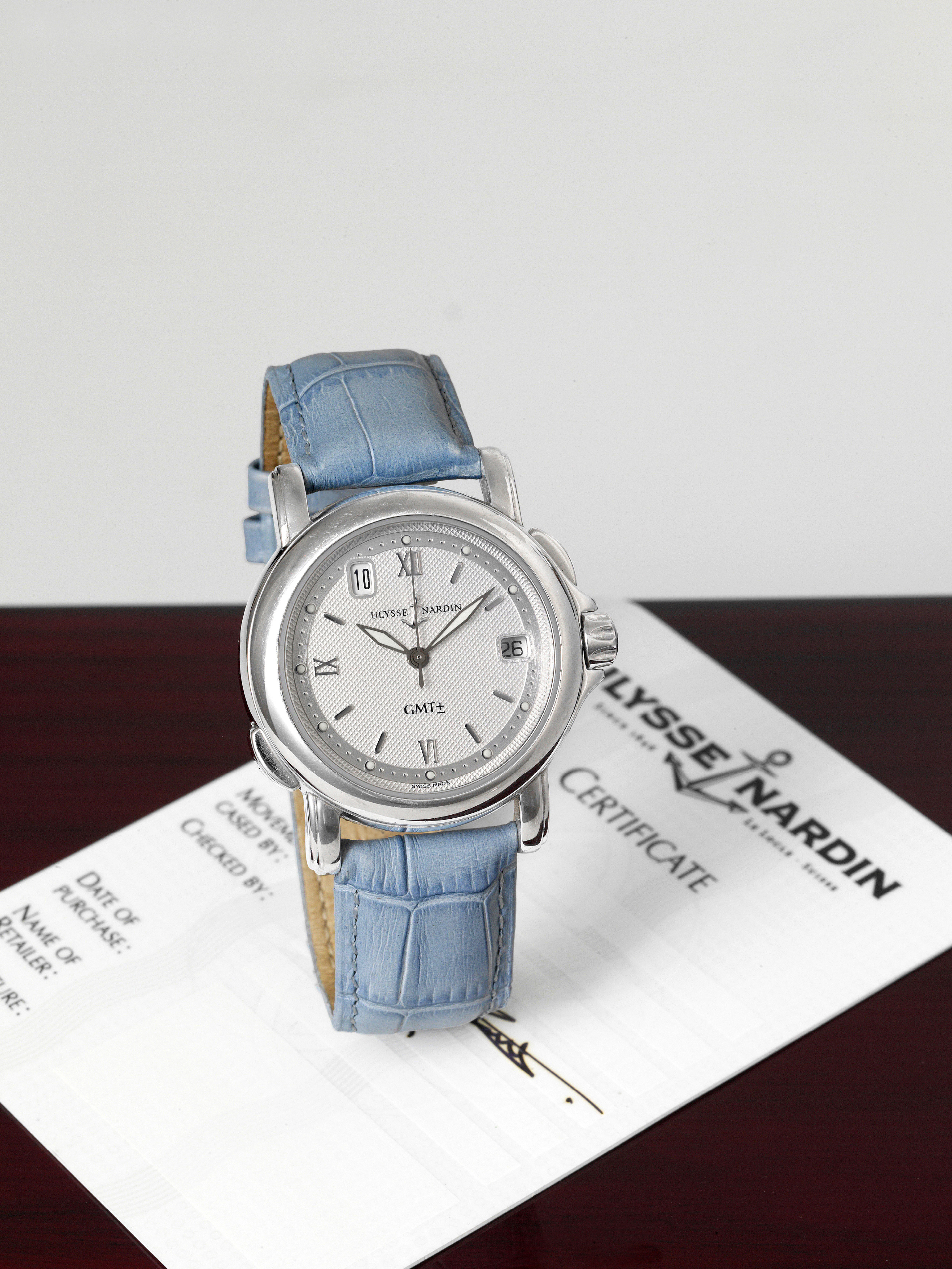Ulysse Nardin GMT
Ulysse Nardin, Locle, Suisse,"San Marco GMT", No. 5385,
Ref. 203-22. Made circa 1995.
Fine, center-seconds, self-winding, water-resistant, stainless
steel wristwatch with 24-hour second time zone, date and
a stainless steel Ulysse Nardin buckle. Accompanied by an
Ulysse Nardin box, Certificate and instruction manual.