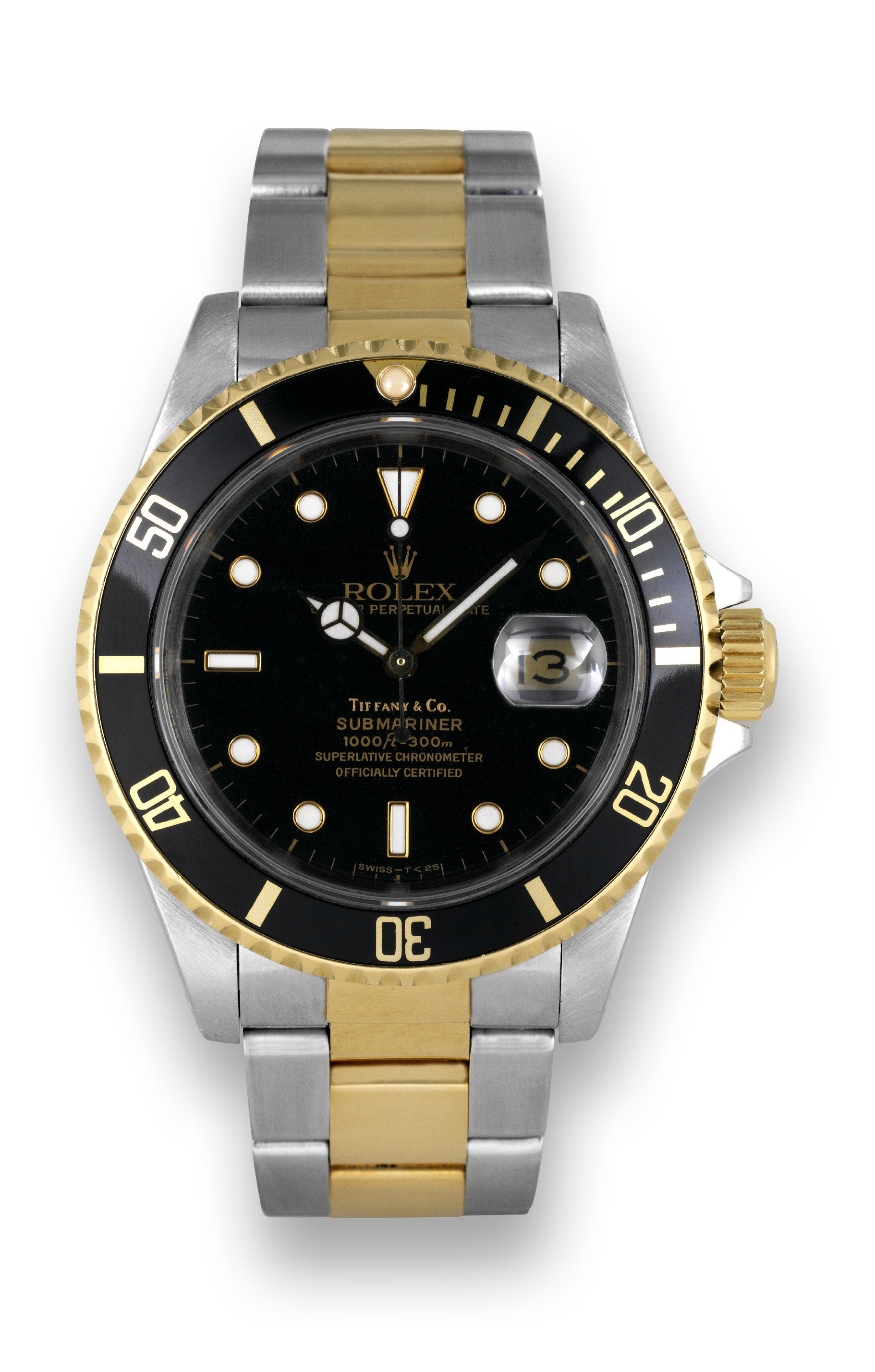 Rolex Ref. 16613 - Steel & Gold Submariner -
Retailed by Tiffany & Co.
Rolex, ?Oyster Perpetual Date, Submariner, 1000 ft /330 m,
Superlative Chronometer Officially Certified," case No. N
168675, Ref. 16613. Made circa 1991.
Fine, center seconds, self-winding, water-resistant, stainless
steel and 18K yellow gold chronometer wristwatch with date
and a stainless steel and 18K yellow gold Fliplock Oyster
bracelet.