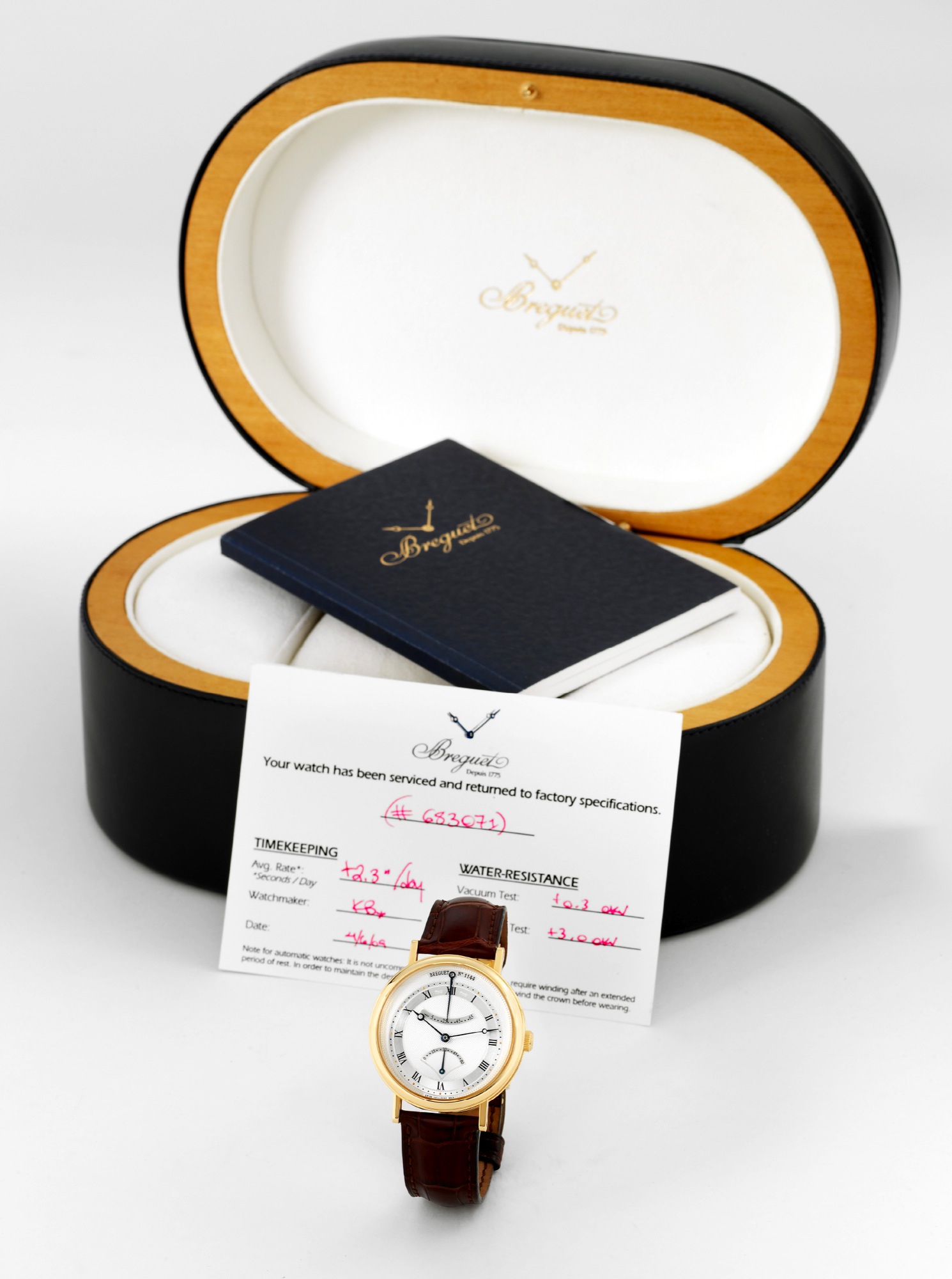 Breguet Ref. 5207 - Yellow Gold - Power Reserve
Breguet, Automatic, Power Reserve, No. 1144, Ref. 5207. Made circa 2005.
Very fine, self-winding, water resistant to 30 meters, 18K yellow gold wristwatch with 65-hour power-reserve indication, retrograde
seconds and an 18K yellow gold Breguet deployant clasp. Accompanied by a fitted box, certificate and service record card.