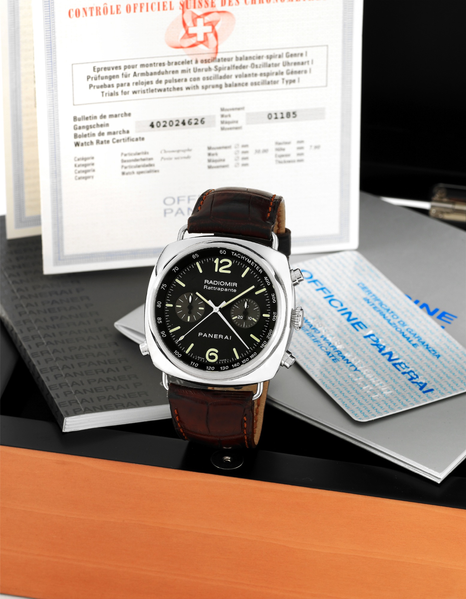 Panerai Steel Radiomir Rattrapante
Officine Panerai, "Radiomir Rattrapante," Automatic
Chronometer, No. H 0416/1000, Ref. OP 6642. Made in a
limited edition of 1000 pieces in 2005, sold June 25th, 2006.
Very fine, large, cushion-shaped, self-winding, water-resistant,
stainless steel diver's wristwatch with round button splitseconds
chronograph, register, tachometer and a stainless
steel Panerai double deployant clasp. Accompanied by the
original fitted wooden box, chronometer certificate