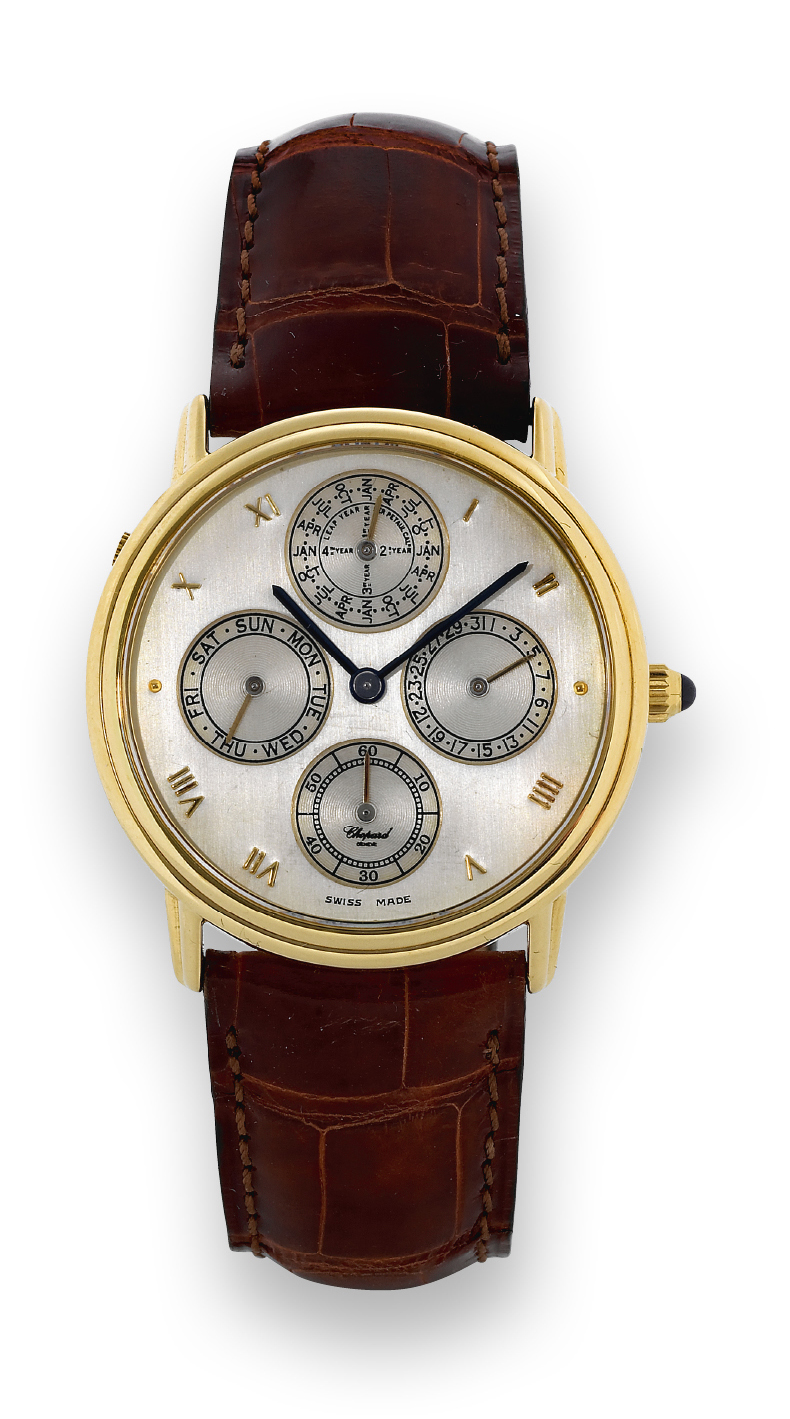 Chopard, Genève. Ref. 1109, No. 214813. Made
in the 1990s.
Fine and unusual 18K yellow gold, water-resistant, self-winding
perpetual calendar wristwatch with leap-year indicator, on
Chopard strap with 18K yellow Chopard buckle.