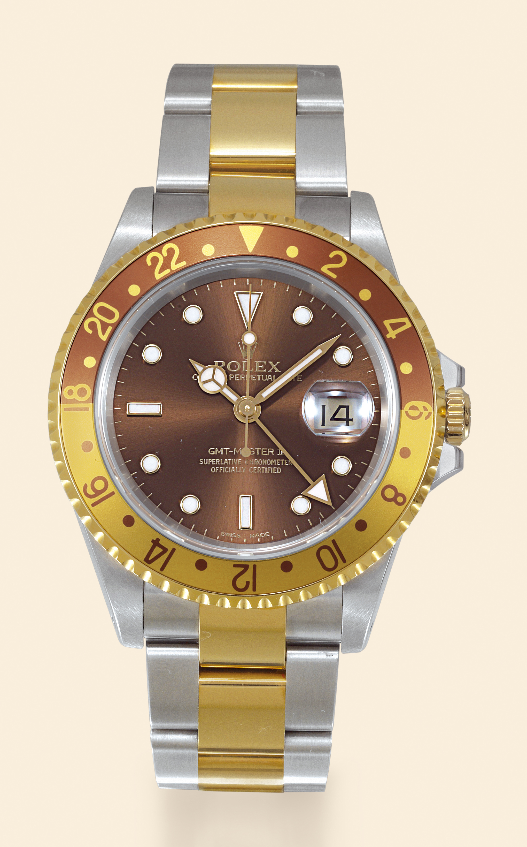 "GMT Master II"
Rolex ?Oyster Perpetual Date GMT Master II,
Superlative Chronometer Officially Certified?,
case No. P427396, Ref. 16713. Made in 2000.
Fine, center seconds, self-winding, three time zone, 18K
yellow gold and stainless steel wristwatch with special 24-
hour bezel and hand, independently adjustable hour hand,
and 18K yellow gold and stainless steel Oysterlock bracelet.Accompanied by a guarantee  (now void)