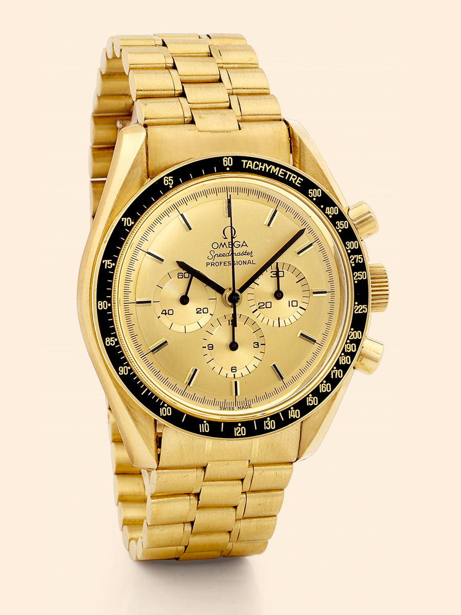 Apollo XI
Omega, ?Speedmaster Professional - Apollo
XI?, Ref. 345.08.02. Made in the late 1990s.
Very fine, 18K yellow gold wristwatch with round button
chronograph, registers, tachometer, black bezel and 18K
yellow gold Omega bracelet with concealed deployant clasp.