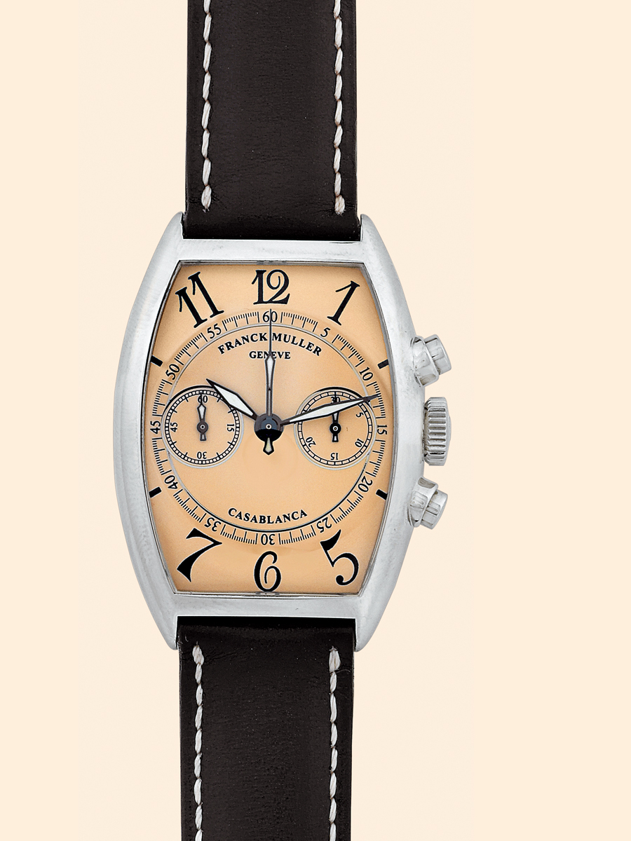 Stainless Steel Casablanca
Chronograph
Franck Muller, Genève,
Ref. 5850 C CC. Made circa 2000.
Fine, tonneau-shaped and curved,
water-resistant, stainless steel wristwatch
with round button chronograph, register
and a stainless steel Franck Muller buckle.
Accompanied by a fitted box and certificate.