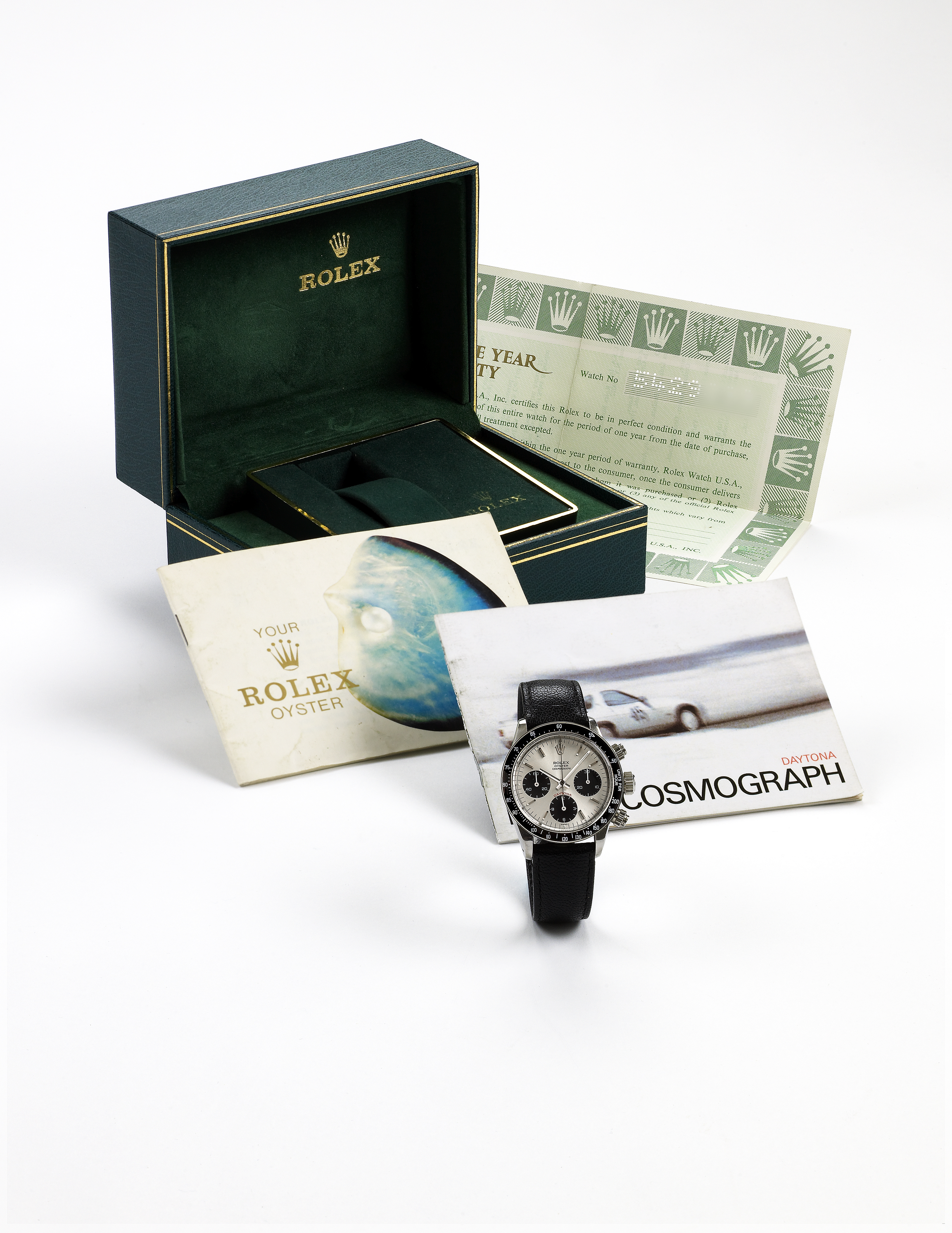 Ref. 6263 Cosmograph Daytona
Rolex, Oyster, Cosmograph Daytona, Ref. 6263. Made in 1977.
Fine and rare, water-resistant, stainless steel wristwatch with round-button chronograph,
registers, anti-reflective black tachometer bezel and a stainless steel Rolex buckle.
Accompanied by the original box and certificate (now void).