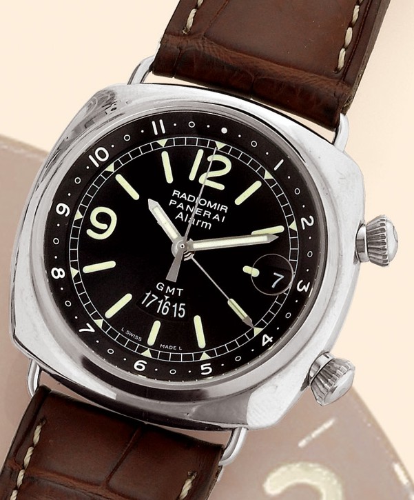 ?Radiomir - GMT/Alarm?
Officine Panerai, Firenze 1860, "Radiomir - GMT/Alarm", No. F028/500, Ref. OP 6563. Produced in a limited
edition of 500 examples in 2003.
Fine and rare, large, two-time zone, center-seconds, self-winding, water-resistant, stainless steel
gentleman's wristwatch with date, alarm and 2 crowns. Accompanied by a fitted box and certificate.