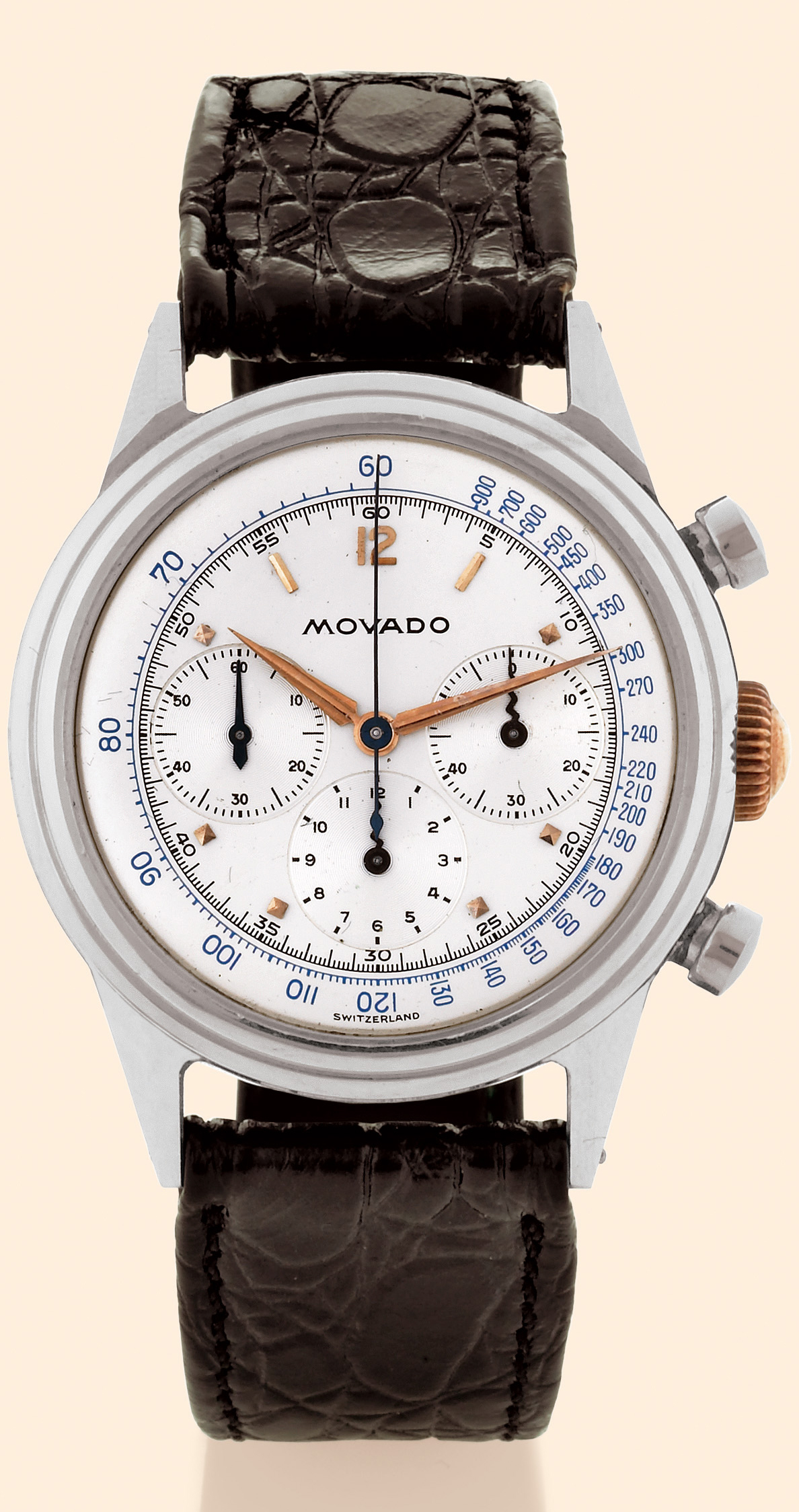 Movado, Ref. 8604. Made in the 1950s.
Fine, stainless steel gentleman's wristwatch with
round button chronograph and registers.