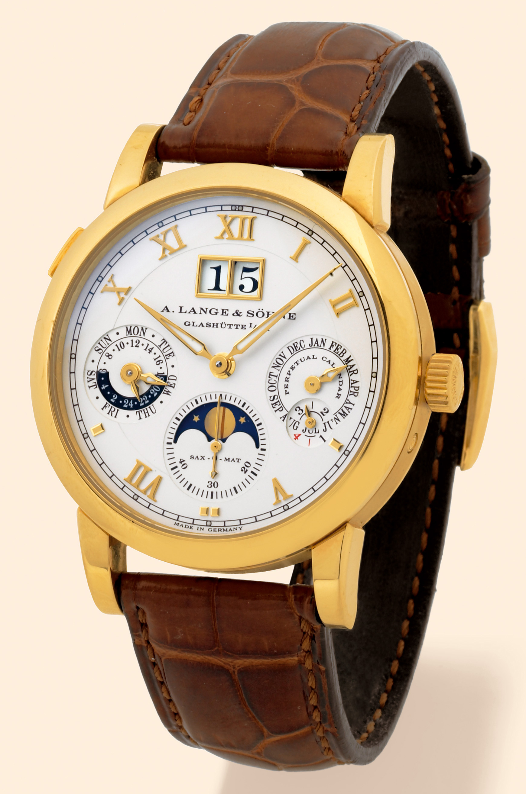 "Langematik Perpetual"
A. Lange & Söhne, Glashütte in Sachsen, "Langematik Perpetual",
No. 28153, case No. 138033, Ref. 310.021. Production of
this reference started in 2001.
Very fine and rare, astronomic, self-winding, water-resistant, 18K yellow
gold gentleman's wristwatch with perpetual calendar, over-sized date,
moon phases and an 18K yellow gold A. Lange & Söhne buckle.
Accompanied by a special fitted winding box and certificate.