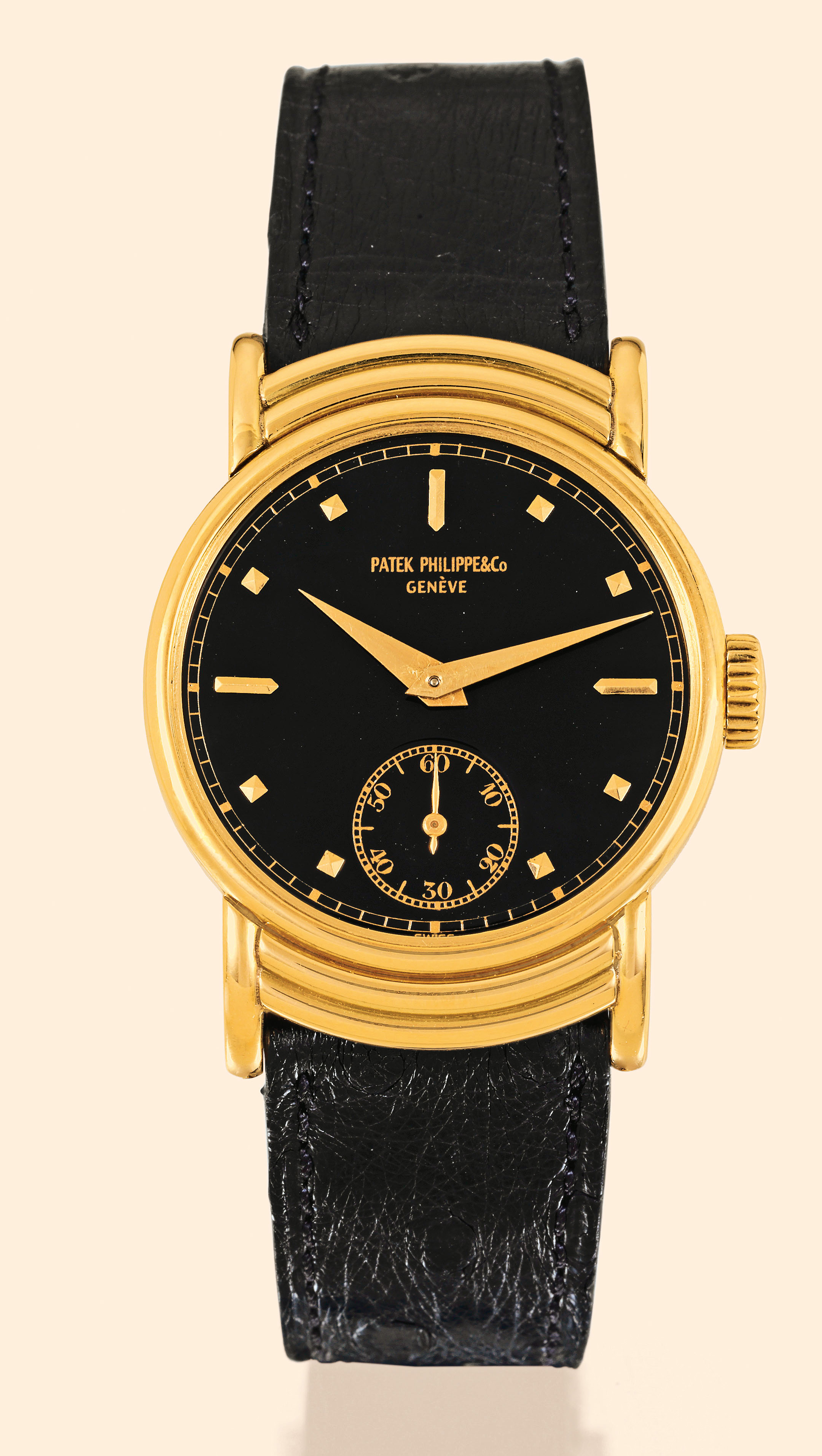 Patek Philippe & Cie, Genève, No. 921511,
case No. 297301, probably Ref. 1435. Made
circa 1941.
Fine and unusual, 18K yellow gold gentleman's wristwatch.