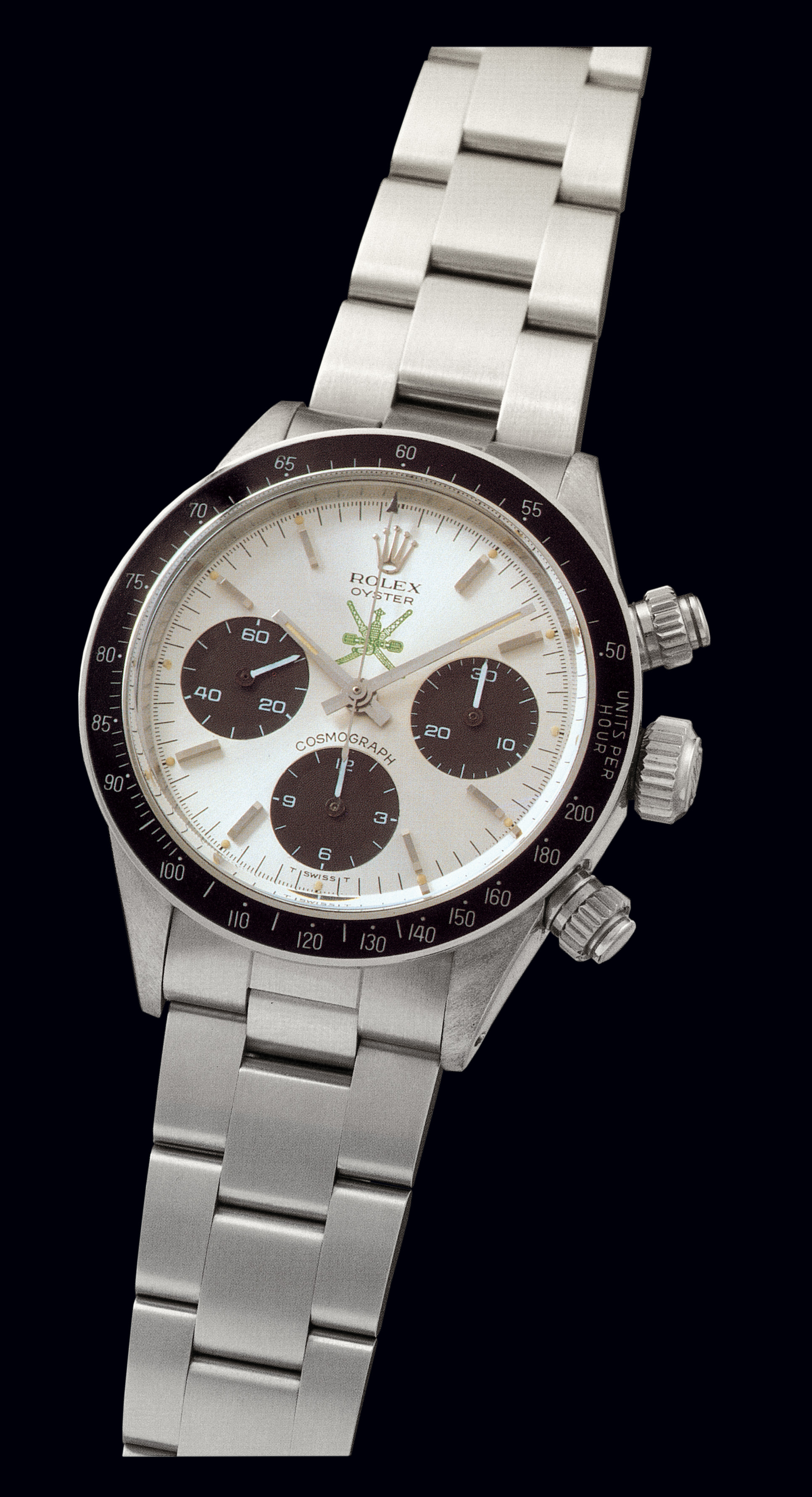 Ref. 6263 Stainless Steel ?Omani Cosmograph?
Rolex, ?Oyster, Cosmograph", Ref. 6263. Case No. 3986302. Made
in 1975 for the Omani Crown.
Fine, water-resistant, stainless steel gentleman's wristwatch with round button
chronograph, registers, anti-reflective black bezel with tachometer and a stainless
steel Rolex Oyster bracelet.