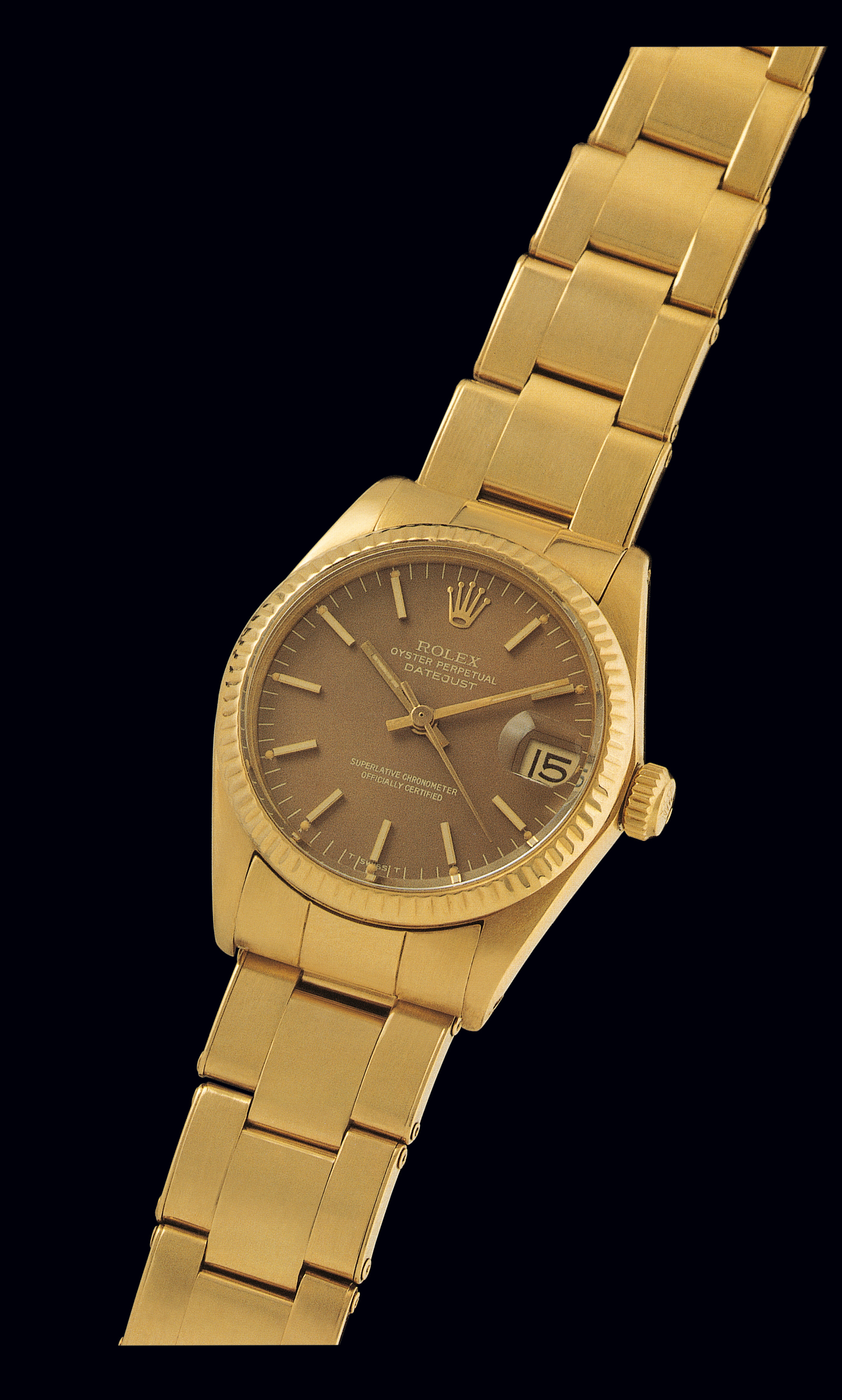 Ref 6827, Yellow Gold ?Datejust?
Rolex,?Oyster Perpetual,Datejust, Superlative Chronometer Officially
Certified?. Ref. 6827, case No 5162843. Made in 1977.
Fine and rare, center seconds, self-winding, water-resistant, 18K yellow gold lady's
wristwatch with an 18K yellow gold Oyster bracelet.