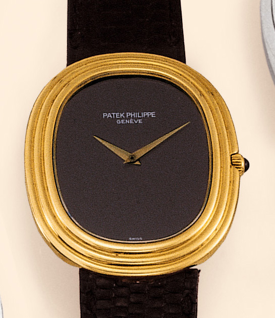 Patek Philippe & Co., Geneve, No. 1287800, case No. 533212, Ref: 3634. Made circa 1980.  Fine, large, elliptical self-winding oval, 18K yellow gold gentleman's wristwatch with concealed lugs.
