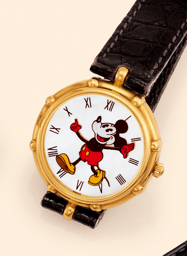 So-called "Mickey Mouse" Gerald Genta, Genève, "Walt Disney," Ref. G 2770.7. Made in the 1990s. Fine and unusual, mid-sized, water-resistant, 18K yellow gold wristwatch with an 18K yellow gold Gerald Genta buckle.